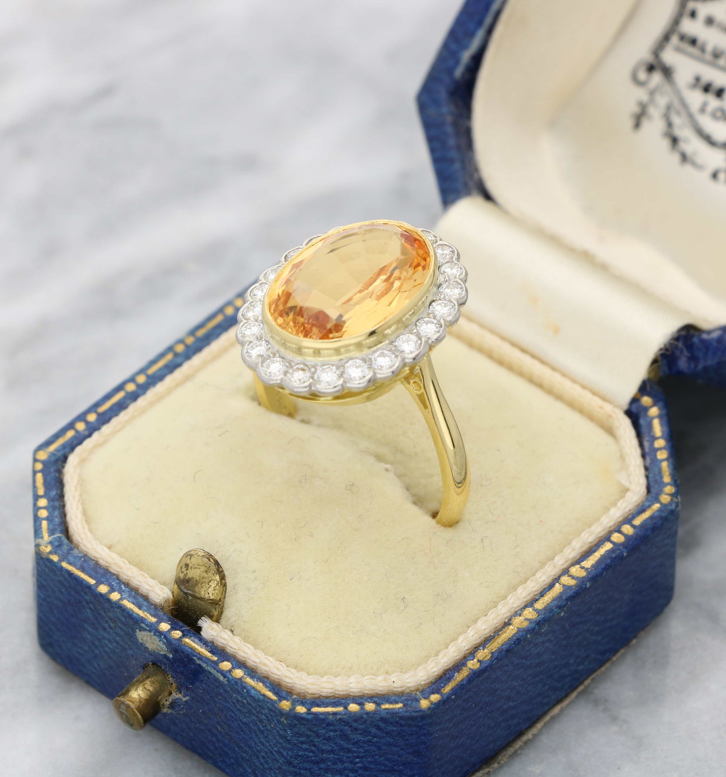 18ct and platinum topaz and diamond cluster ring