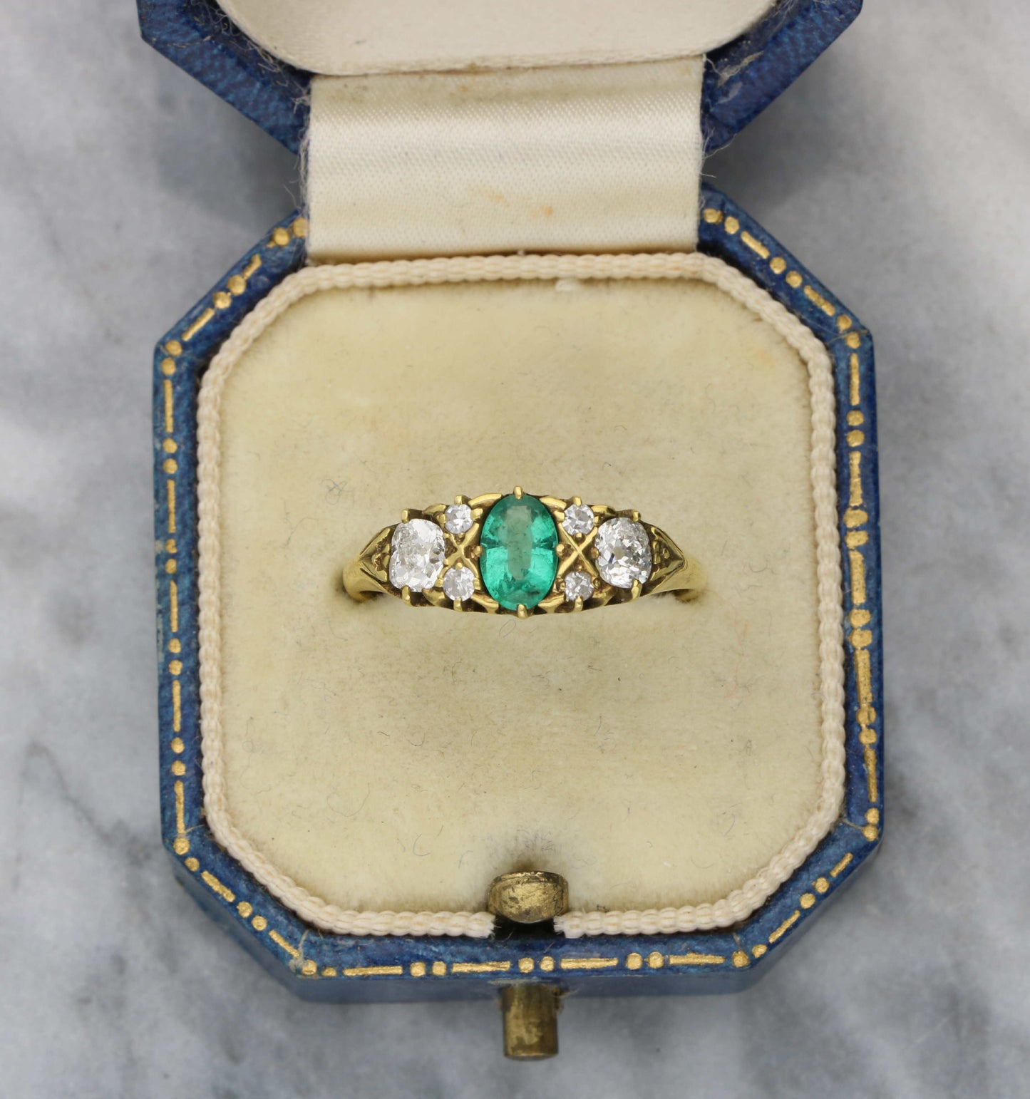 18ct emerald and old cut diamond carved ring