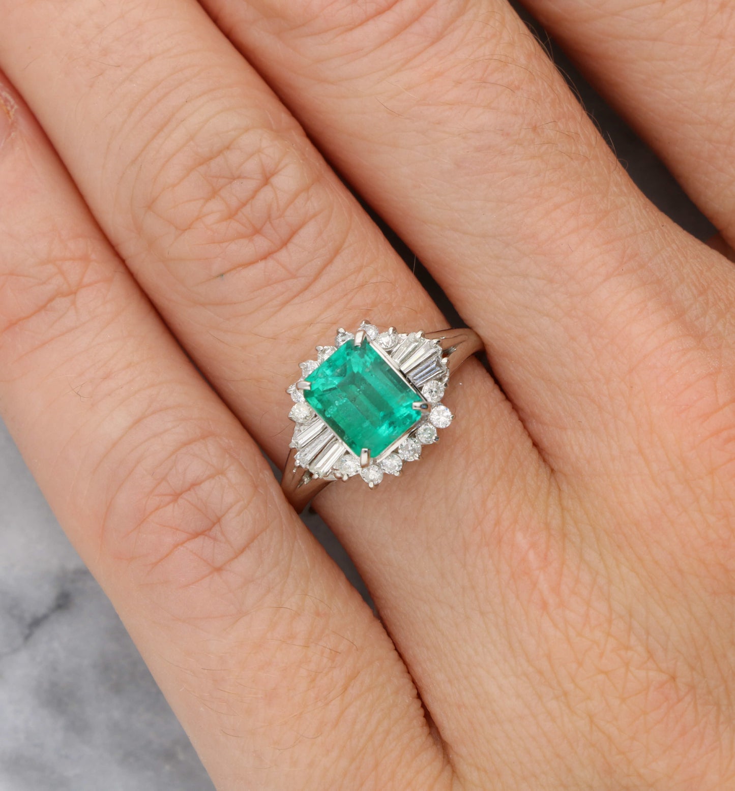 Platinum emerald and diamond cluster ring
