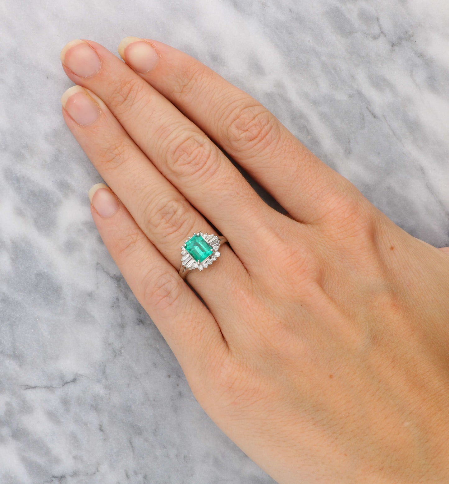 Platinum emerald and diamond cluster ring