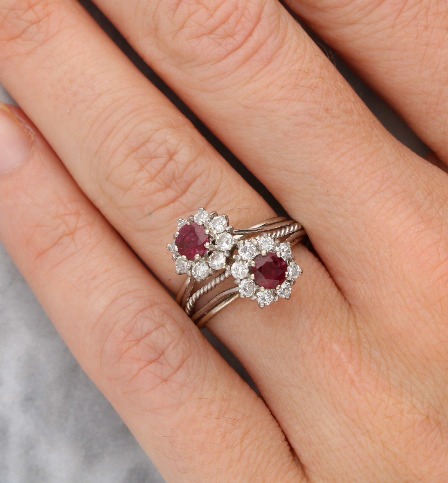 Ruby and diamond cluster crossover ring