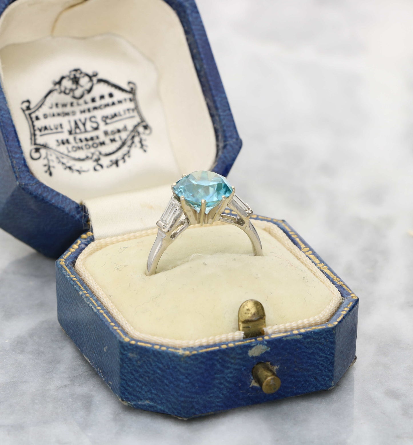 Zircon and baguette-cut diamond 3 stone ring
