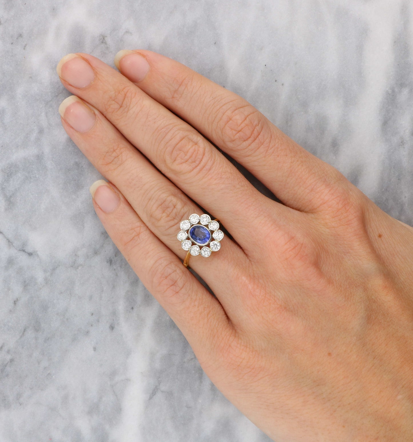 18ct sapphire and diamond cluster engagement ring