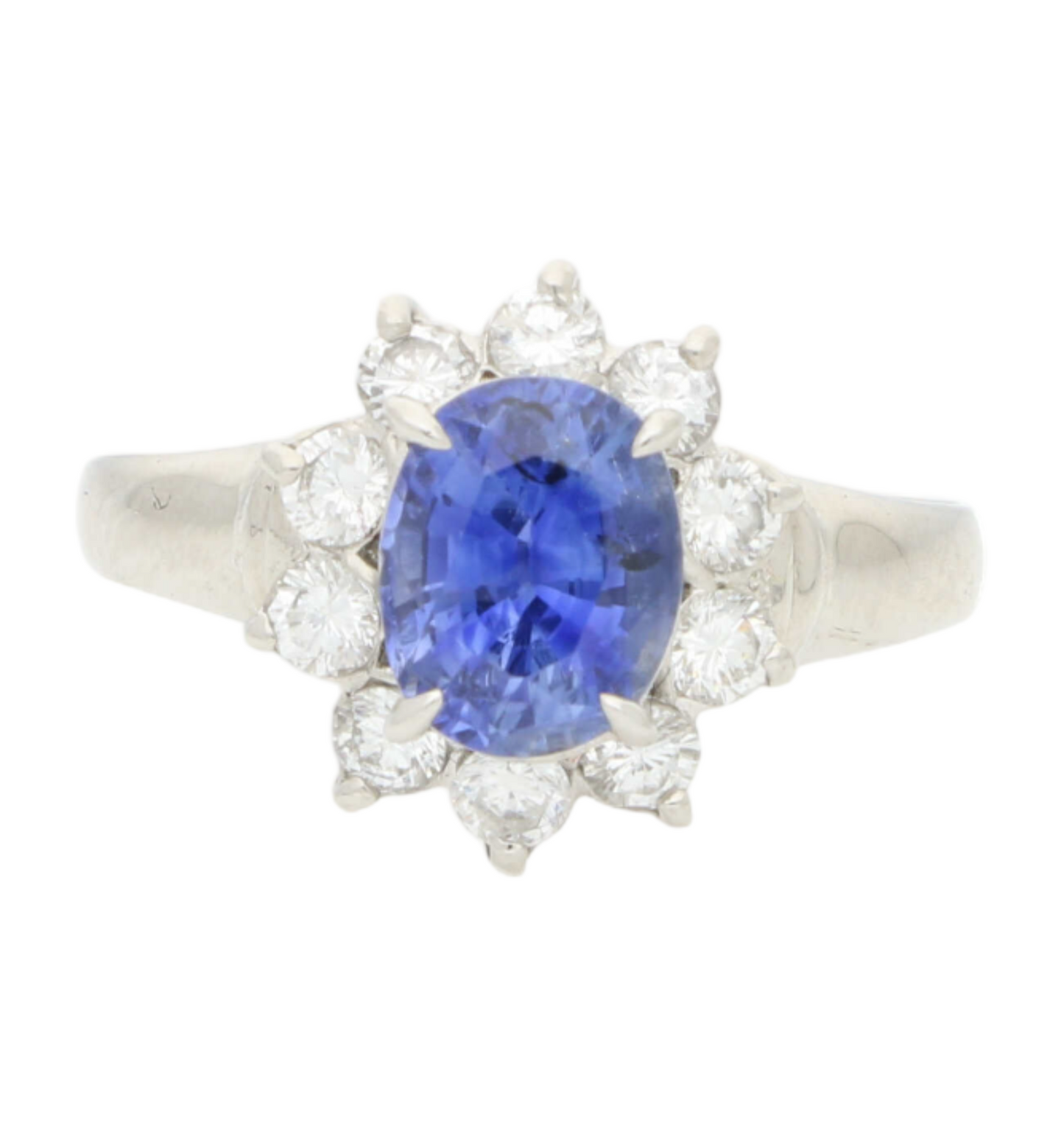Platinum sapphire and diamond cluster engagement ring