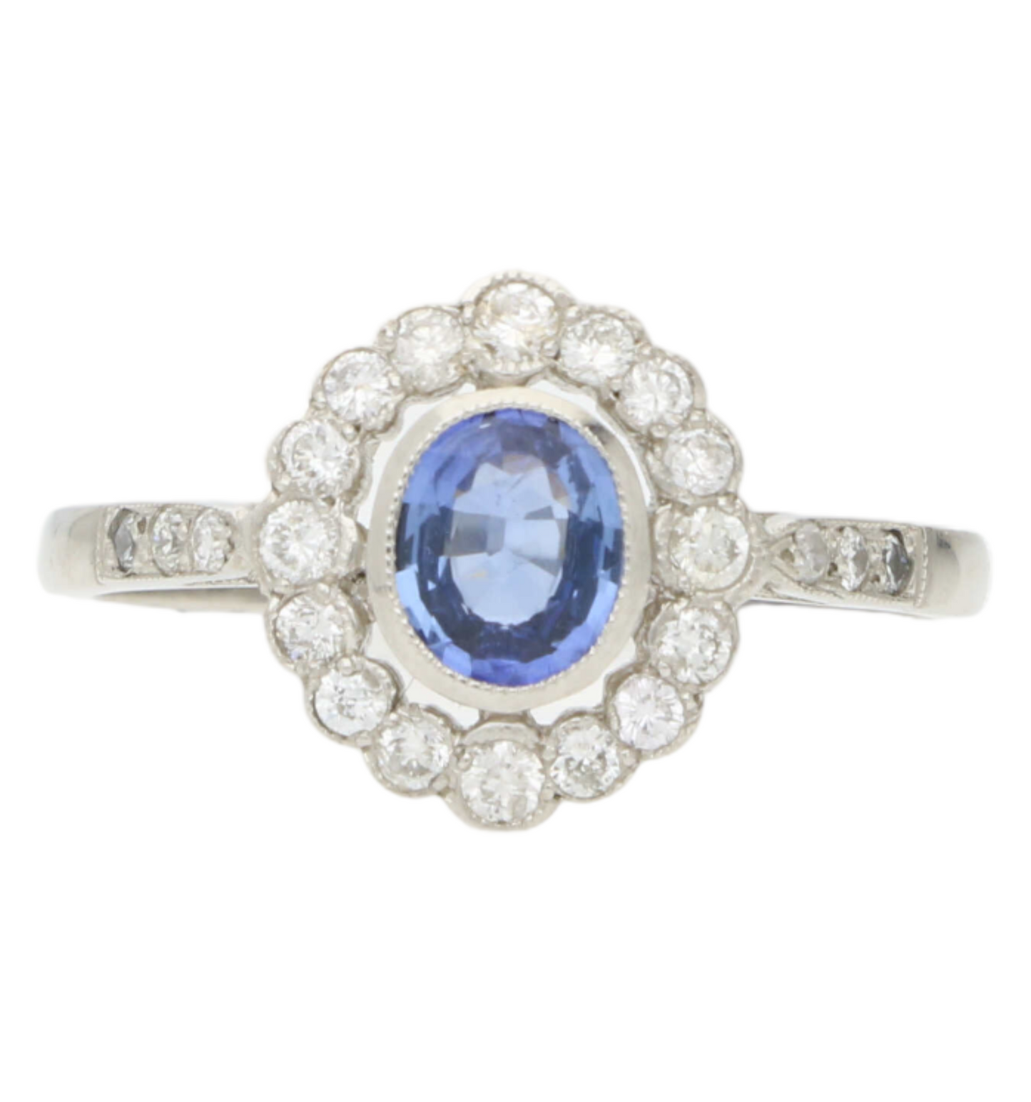 Platinum sapphire and diamond cluster engagement ring