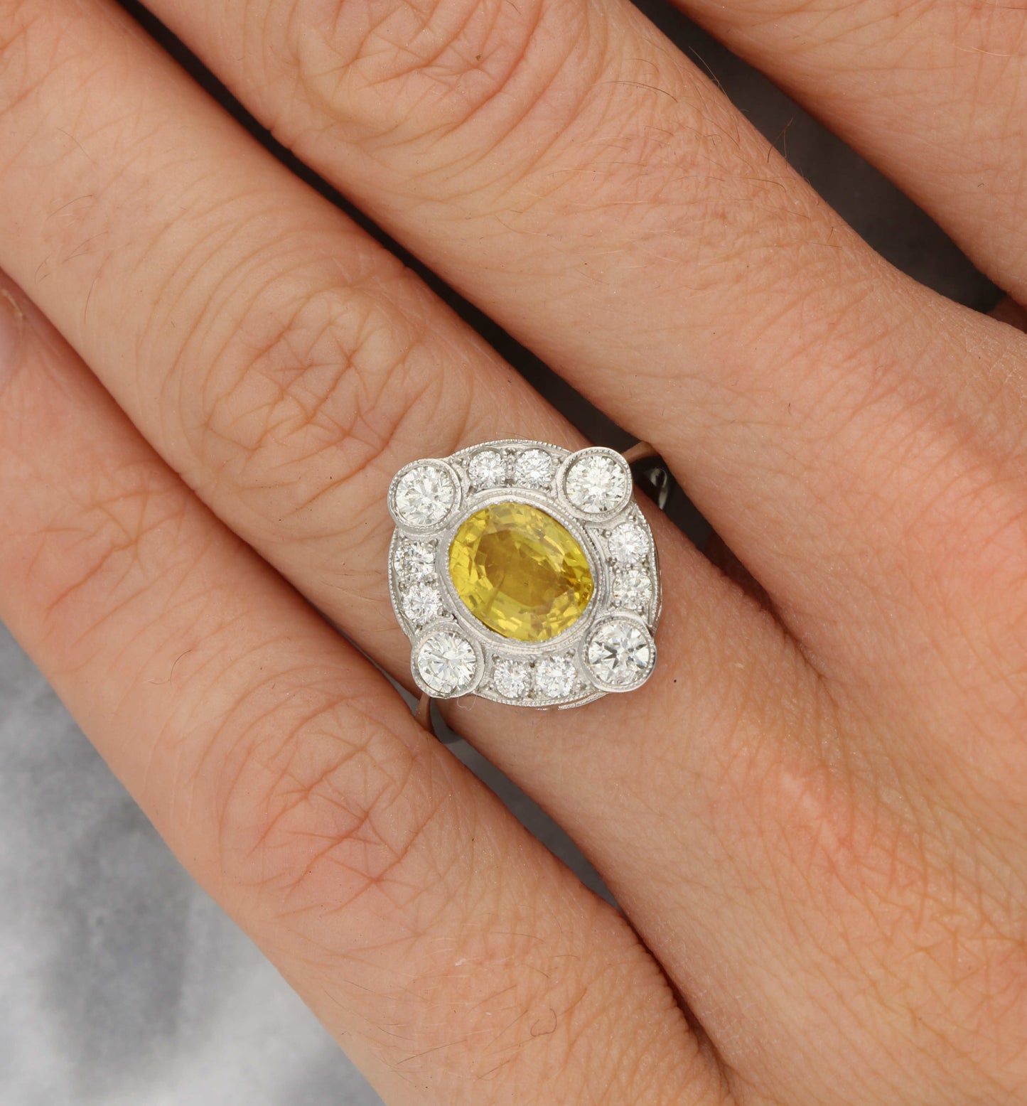Platinum yellow sapphire and diamond Art Deco style engagement ring