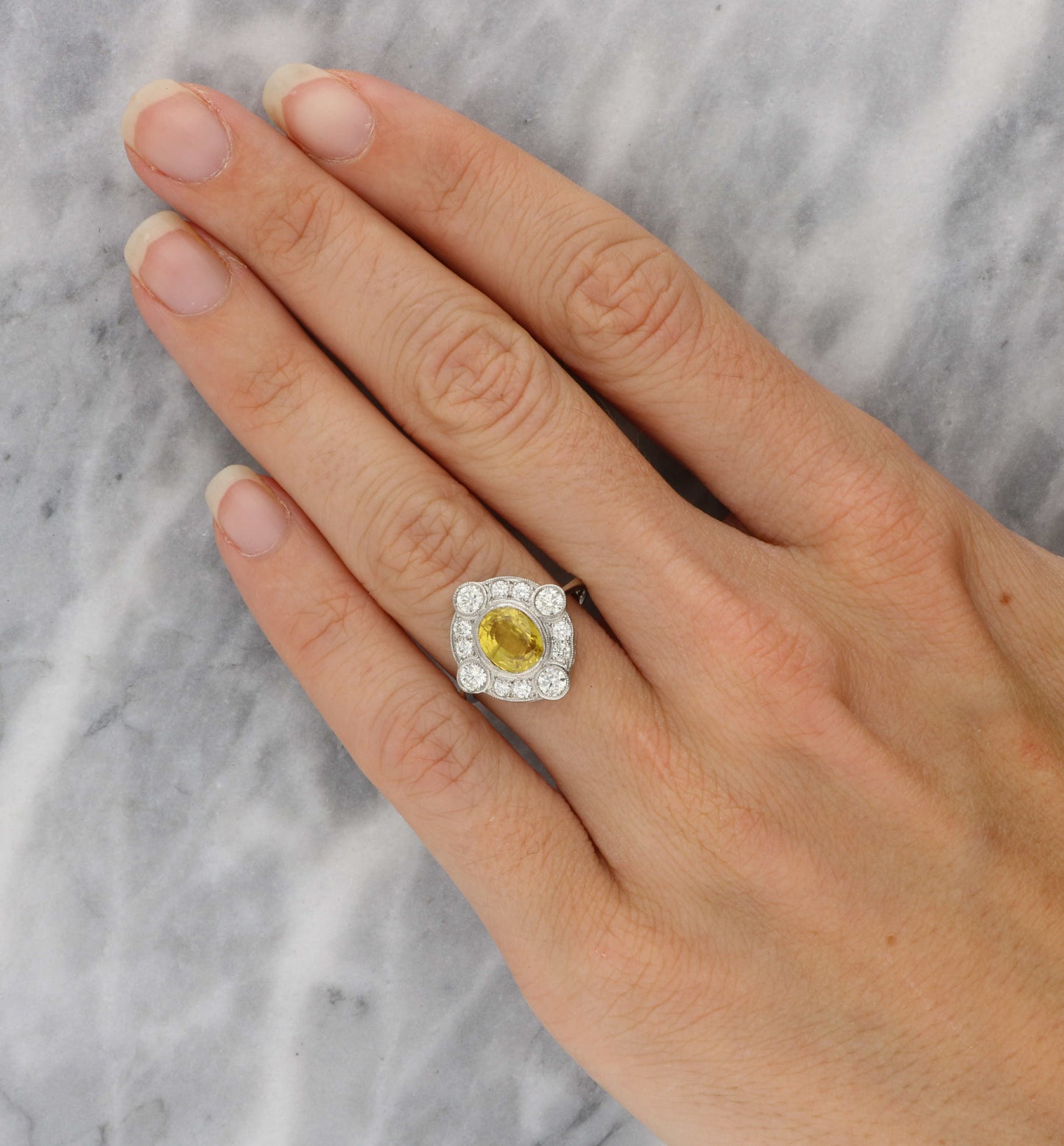 Platinum yellow sapphire and diamond Art Deco style engagement ring