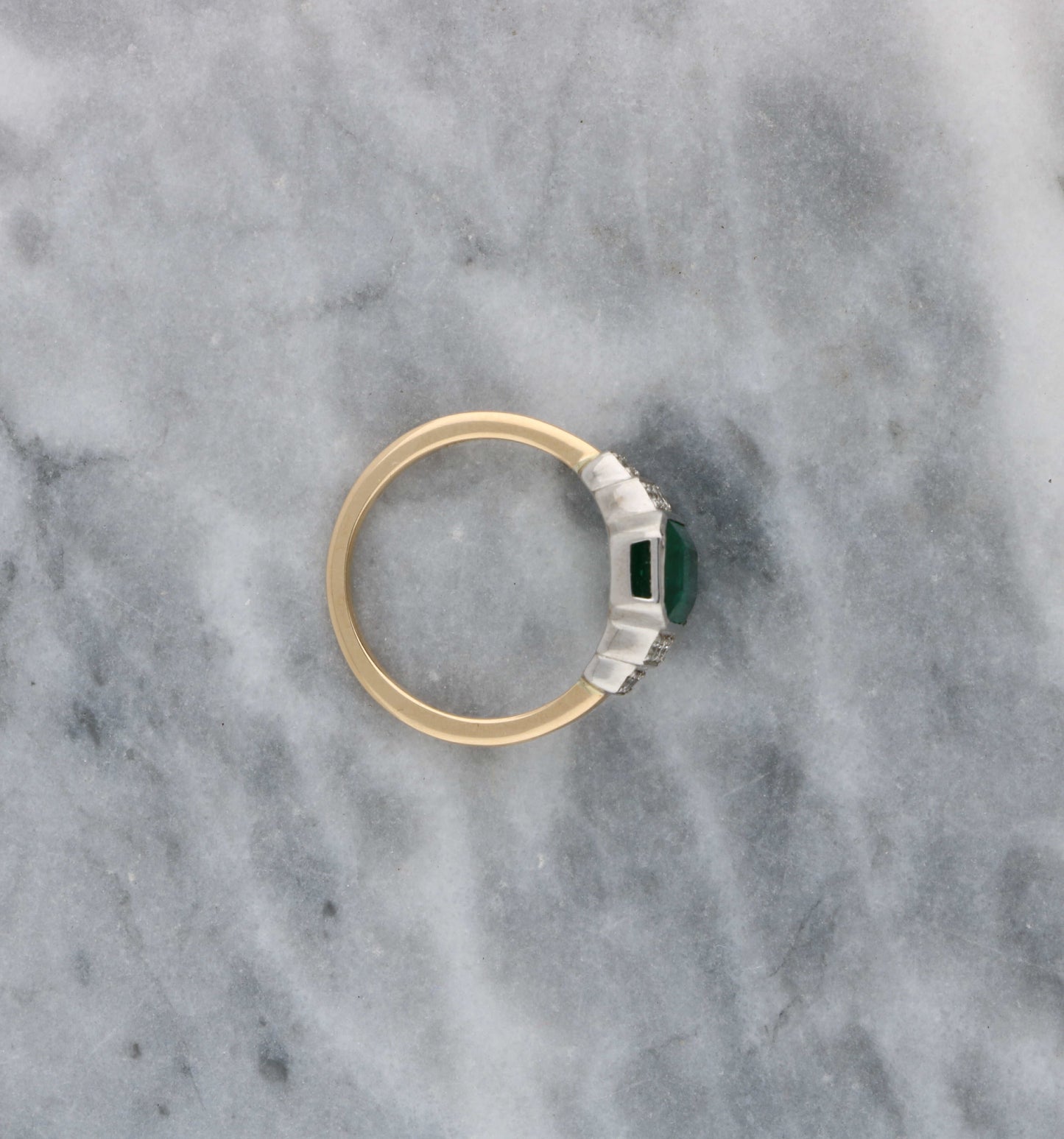 18ct rose gold emerald and diamond engagement ring