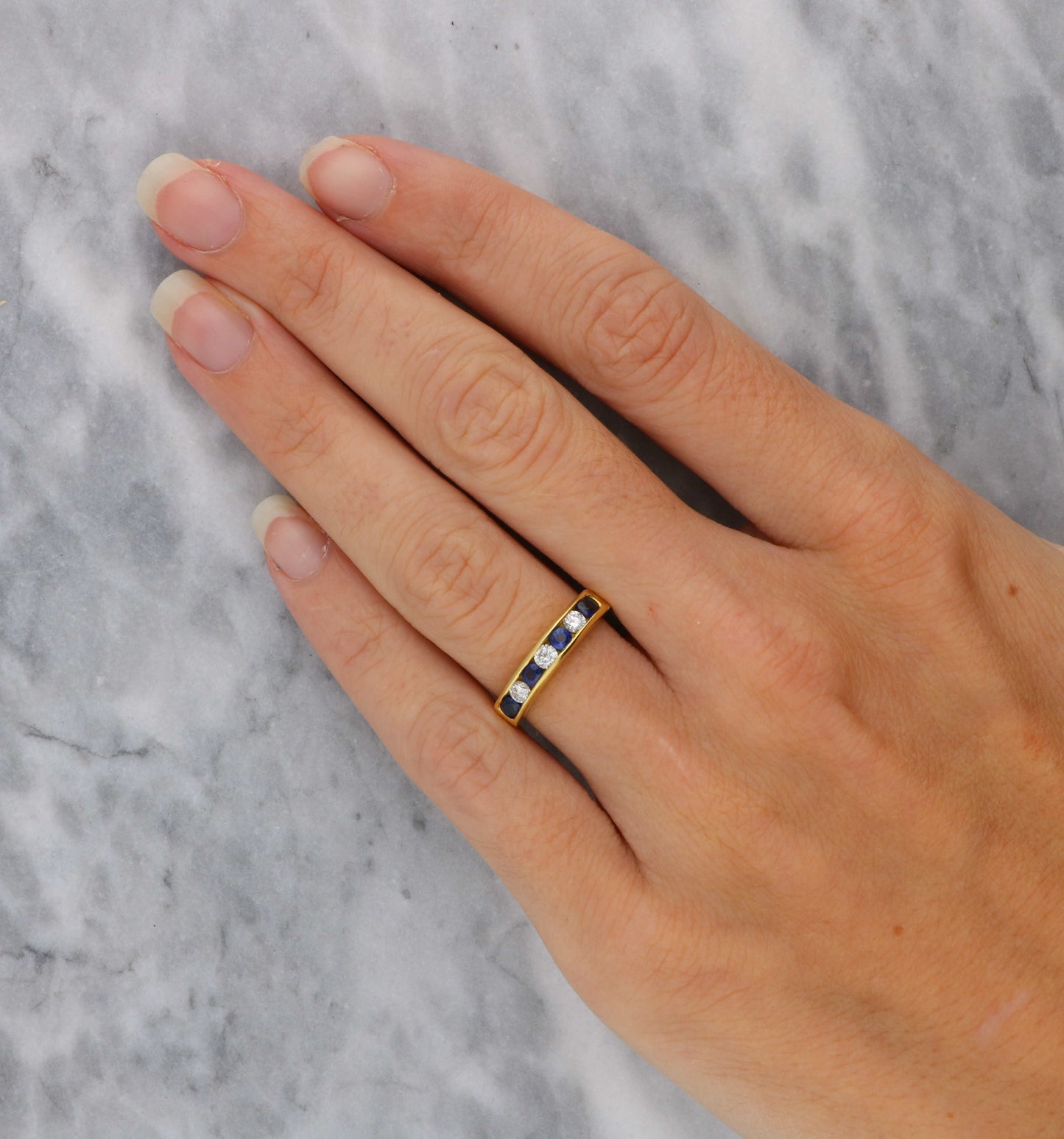 18ct sapphire and diamond half eternity ring