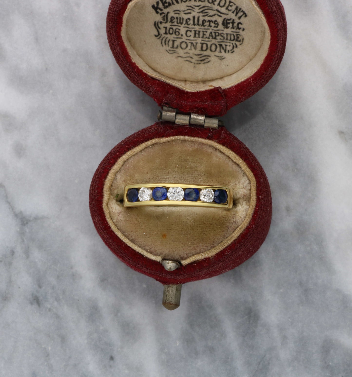 18ct sapphire and diamond half eternity ring