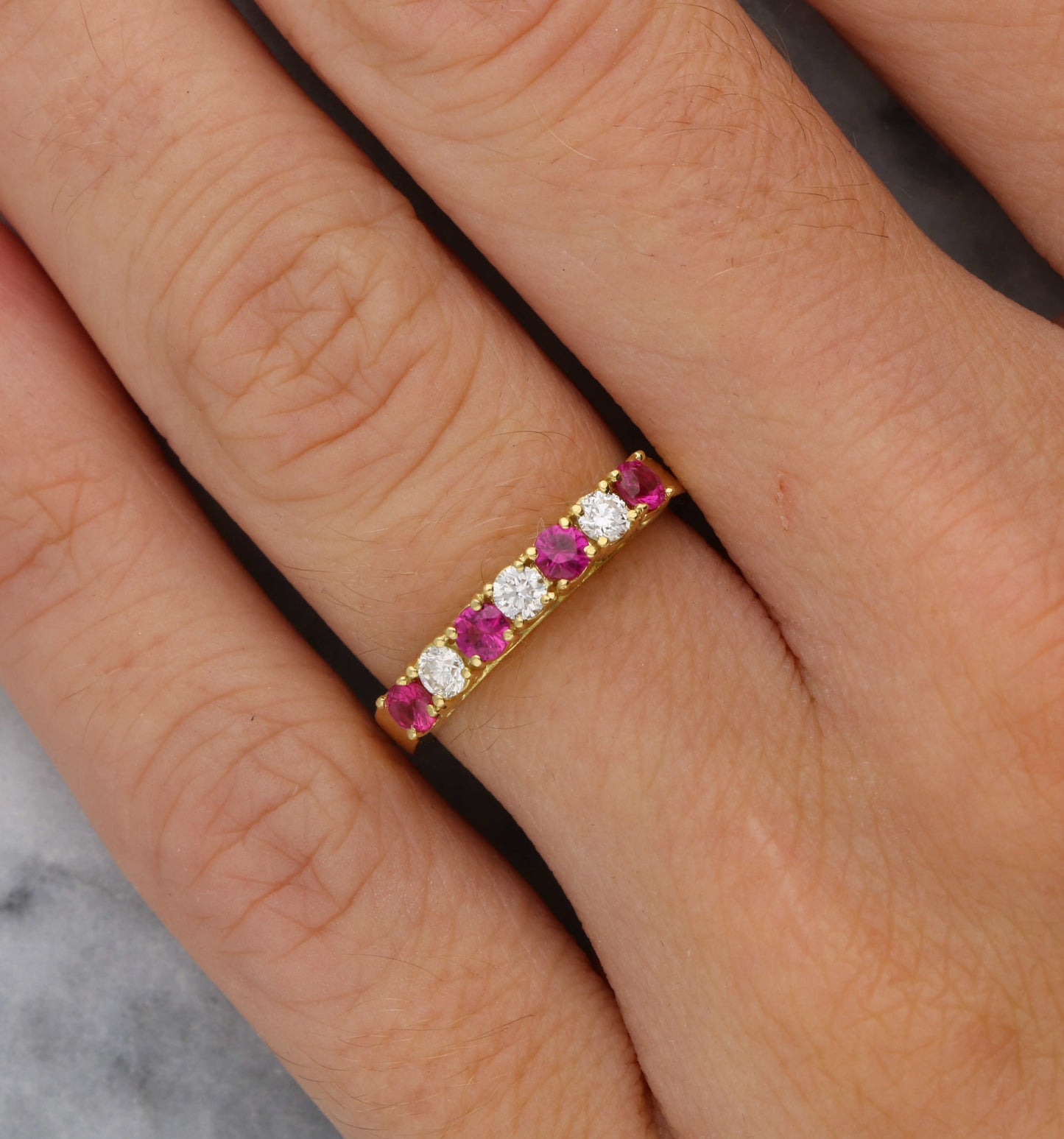 18ct ruby and diamond half eternity ring