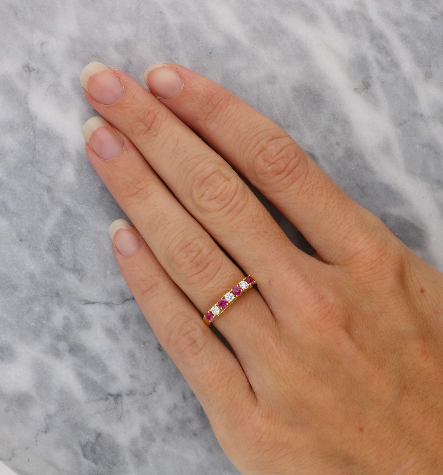 18ct ruby and diamond half eternity ring
