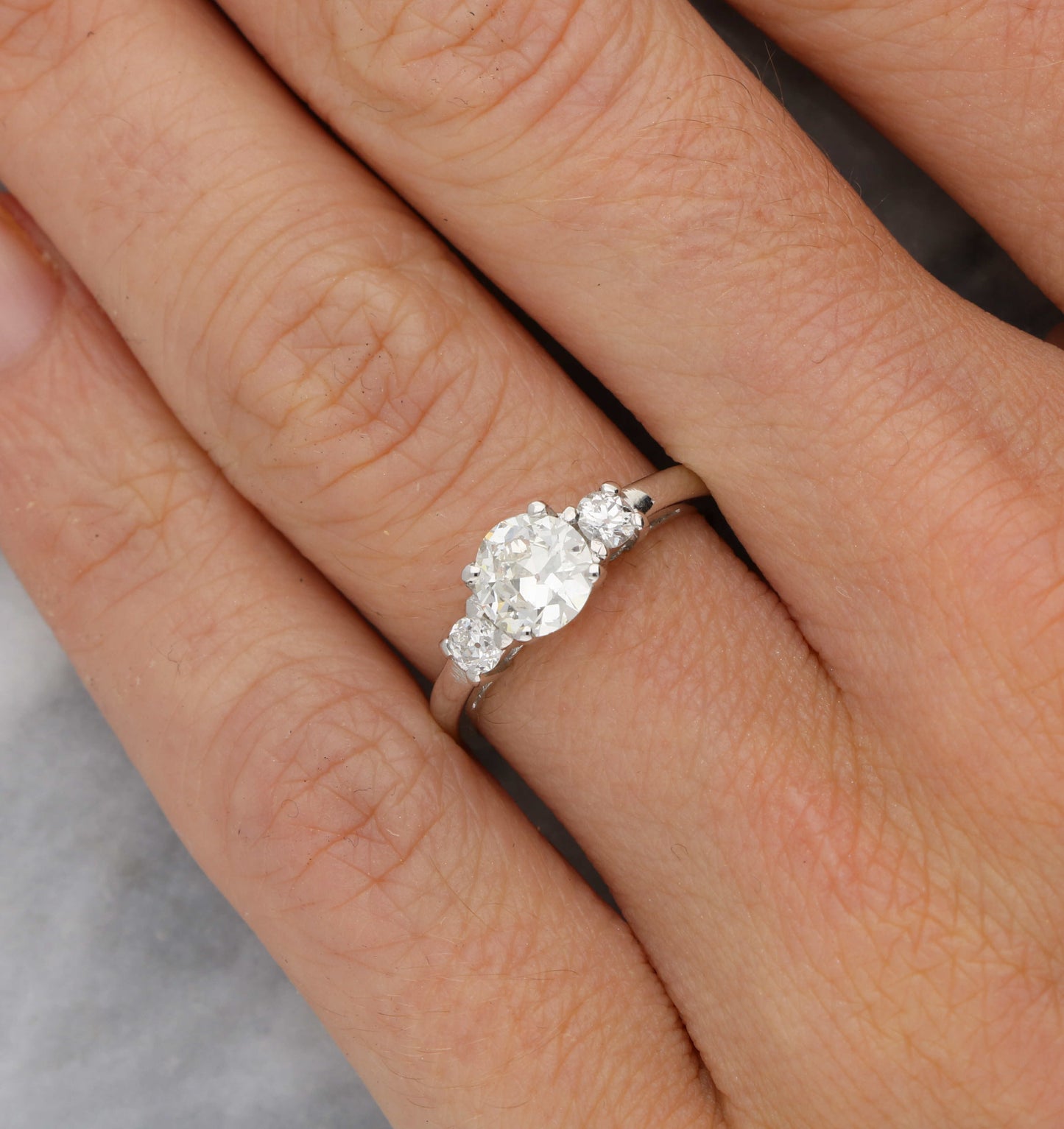 Platinum old cut diamond 3 stone engagement ring