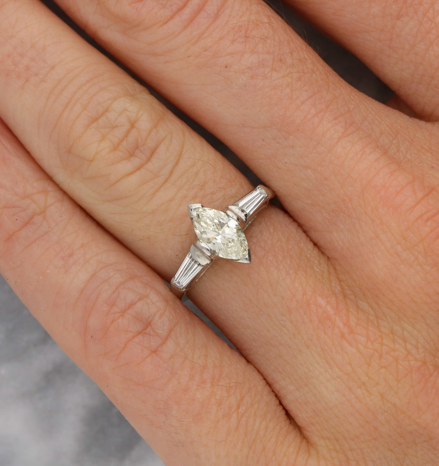 Platinum marquise and tapered baguette diamond engagement ring