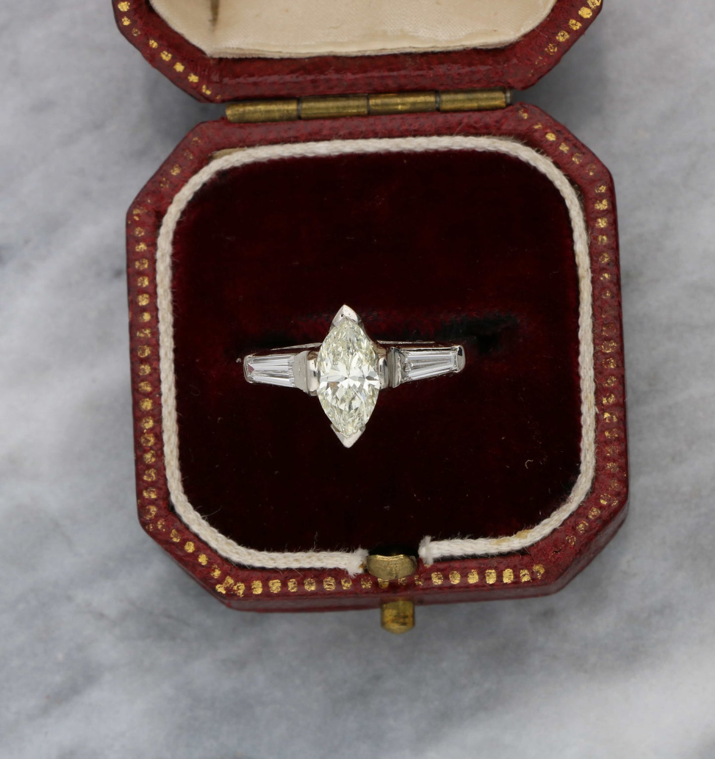 Platinum marquise and tapered baguette diamond engagement ring