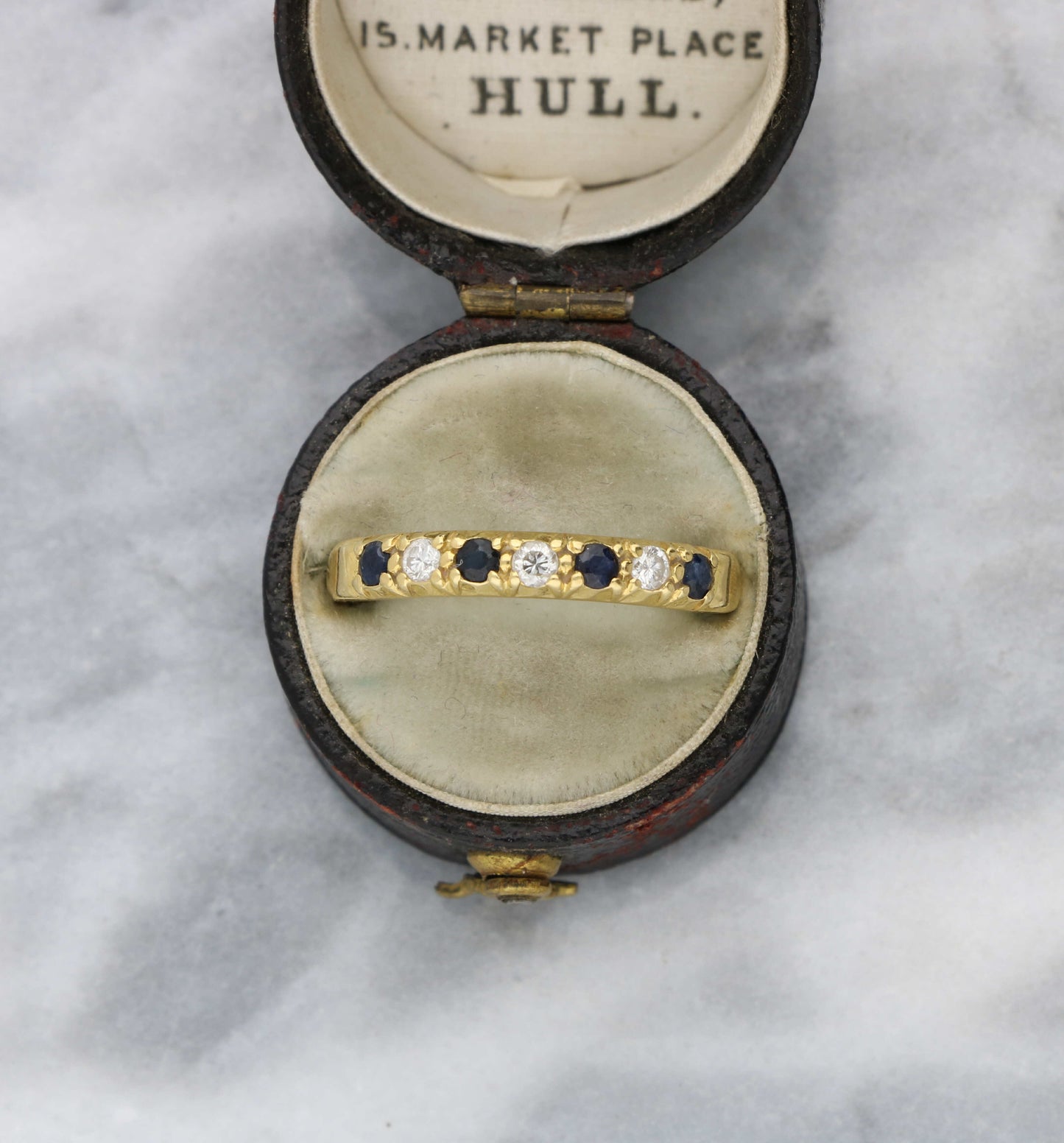 18ct sapphire and diamond half eternity ring