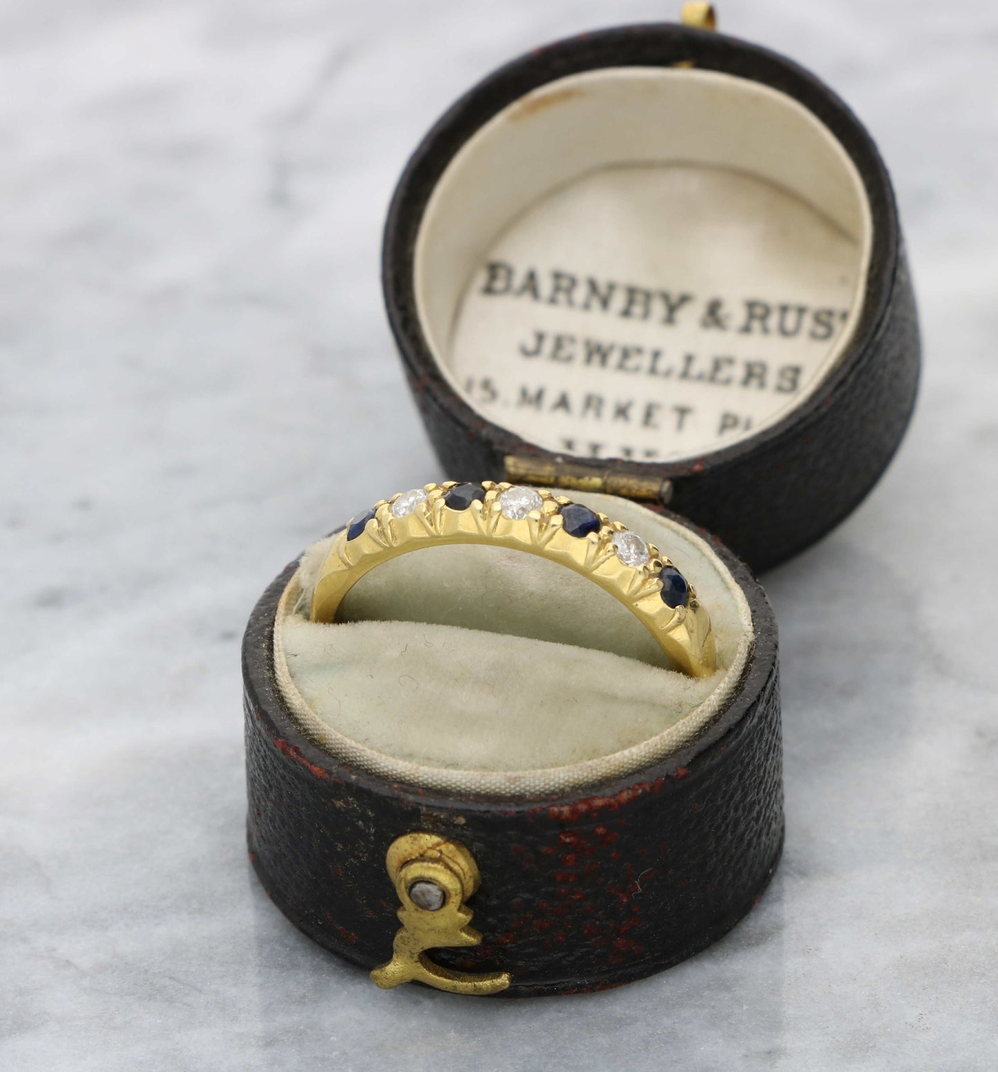 18ct sapphire and diamond half eternity ring