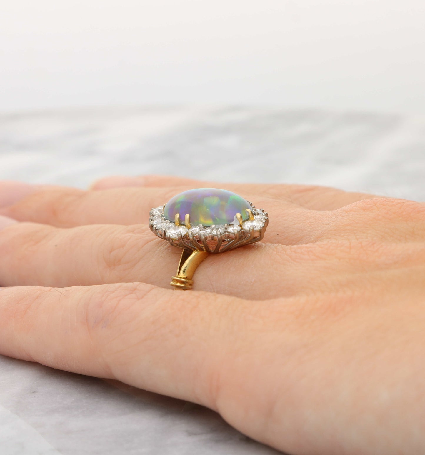 18ct black opal and diamond cluster ring