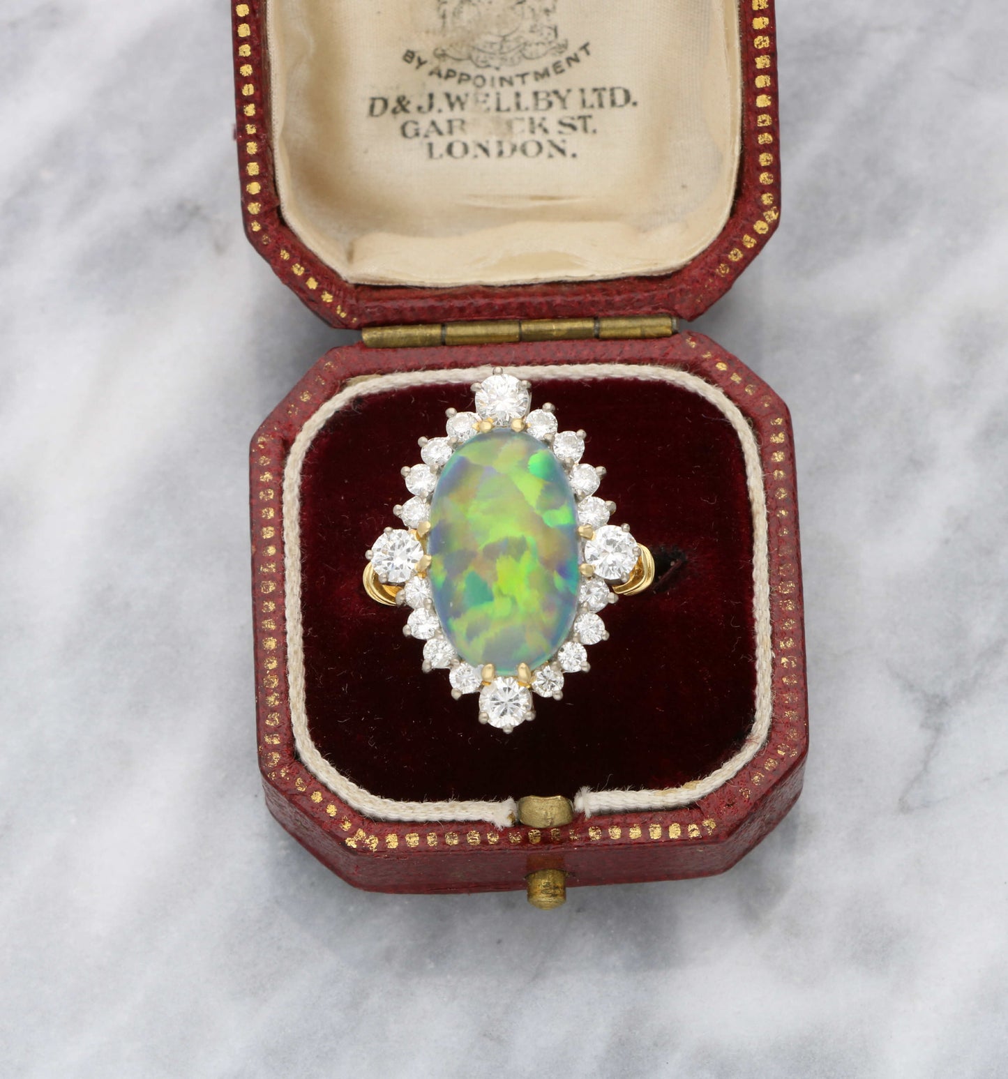 18ct black opal and diamond cluster ring