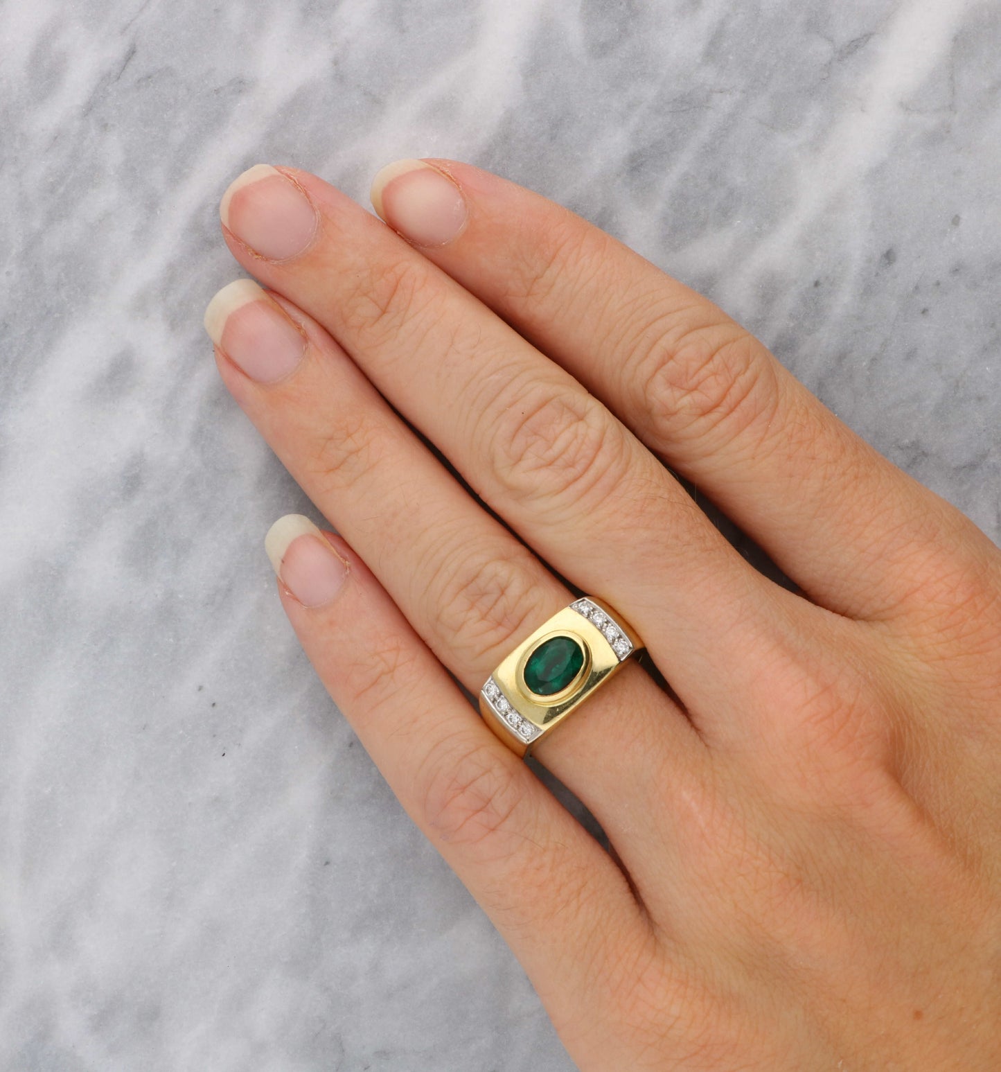 18ct emerald and diamond ring