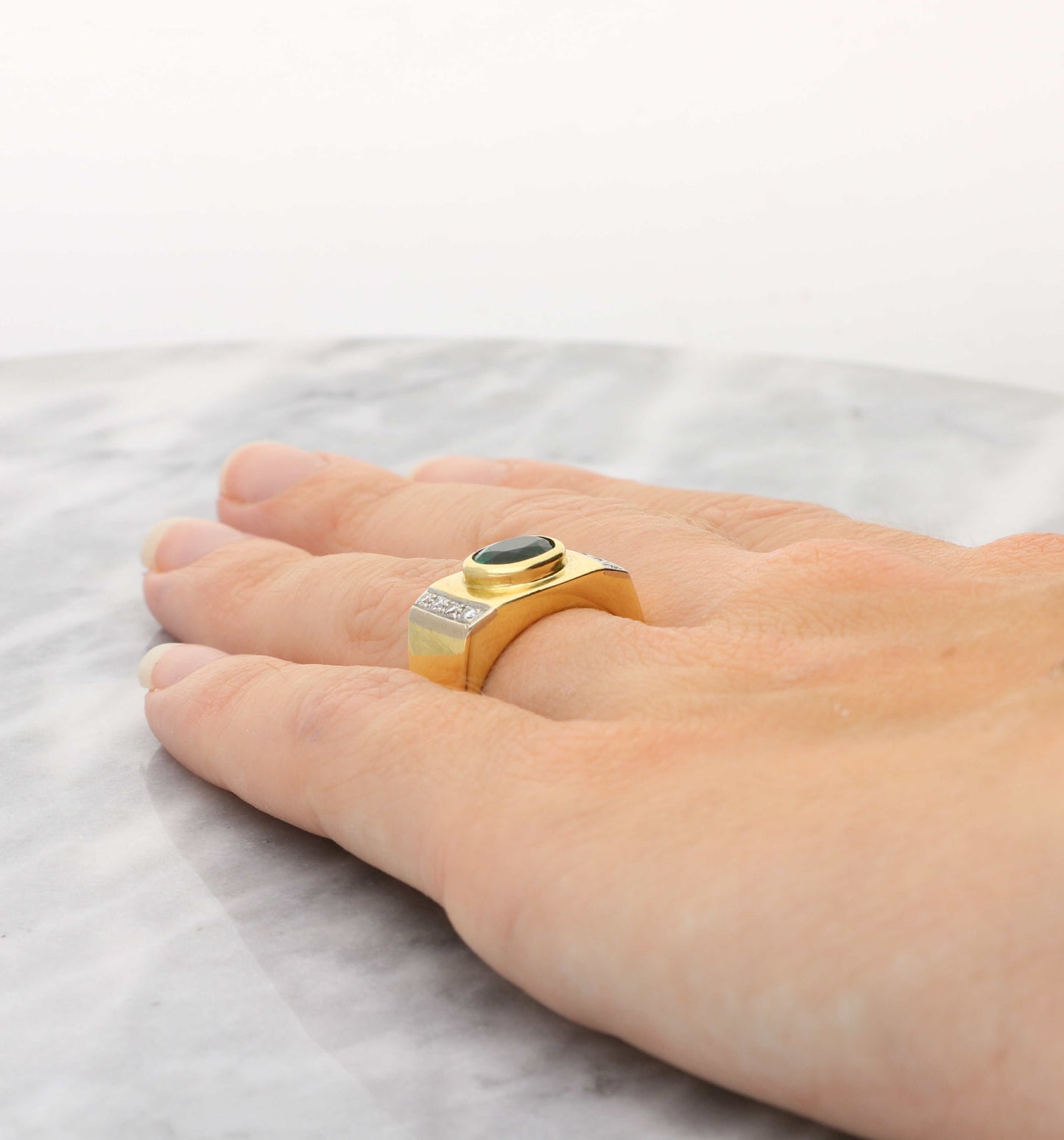 18ct emerald and diamond ring