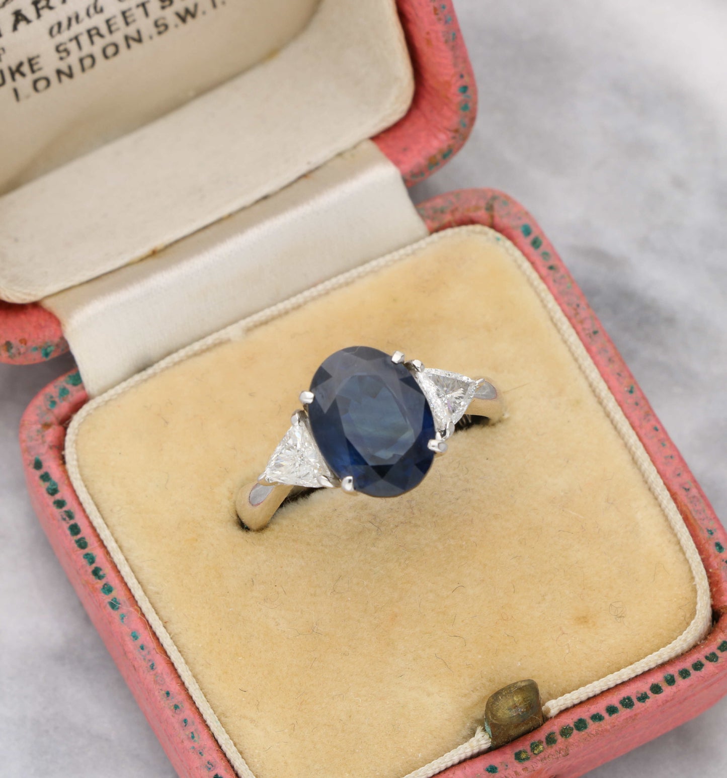 Platinum sapphire and diamond 3 stone engagement ring