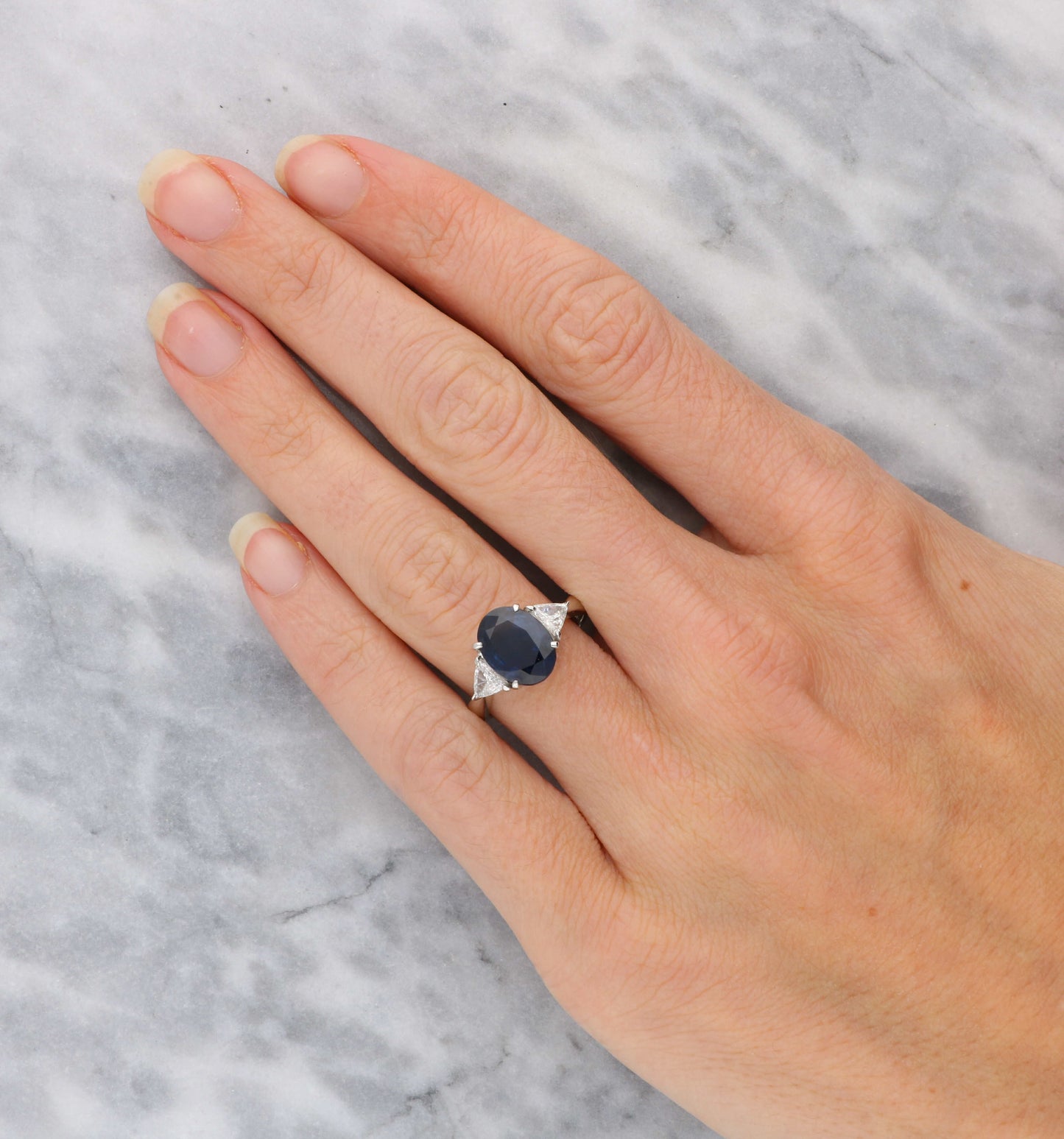 Platinum sapphire and diamond 3 stone engagement ring