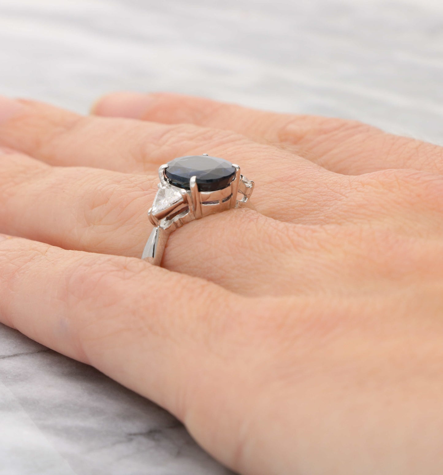 Platinum sapphire and diamond 3 stone engagement ring