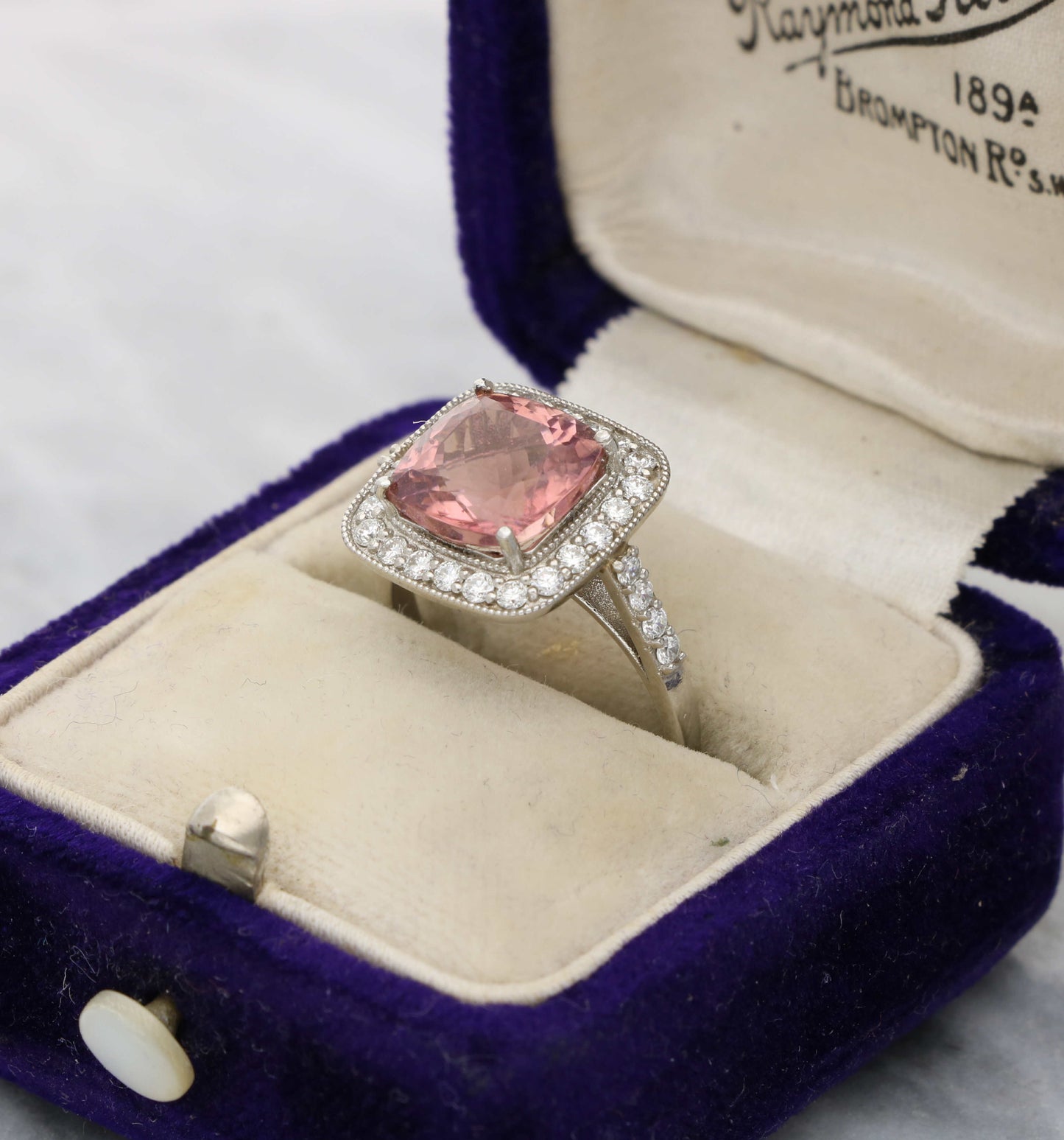 Platinum pink tourmaline and diamond cluster ring