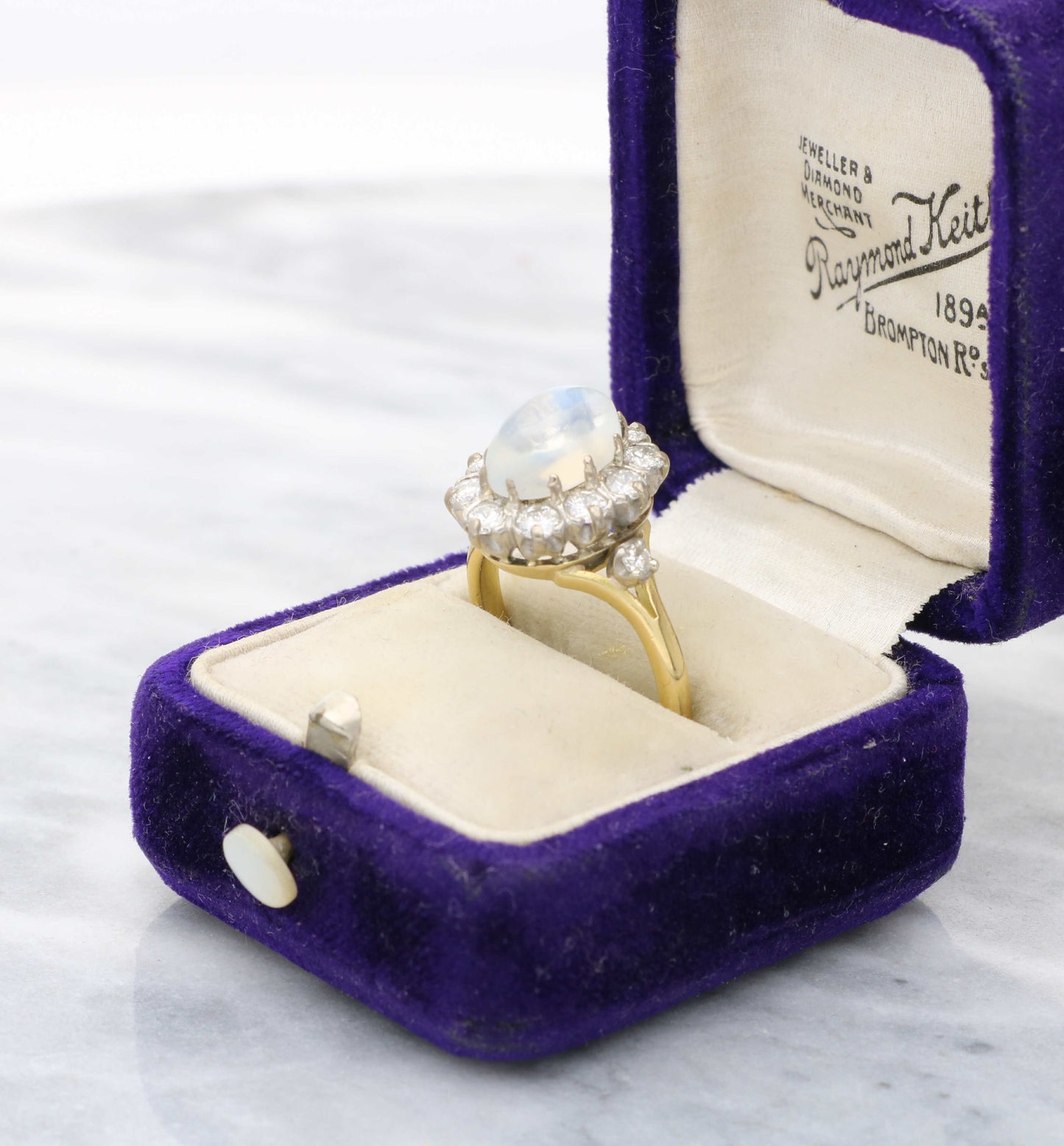 18ct moonstone and diamond cluster ring