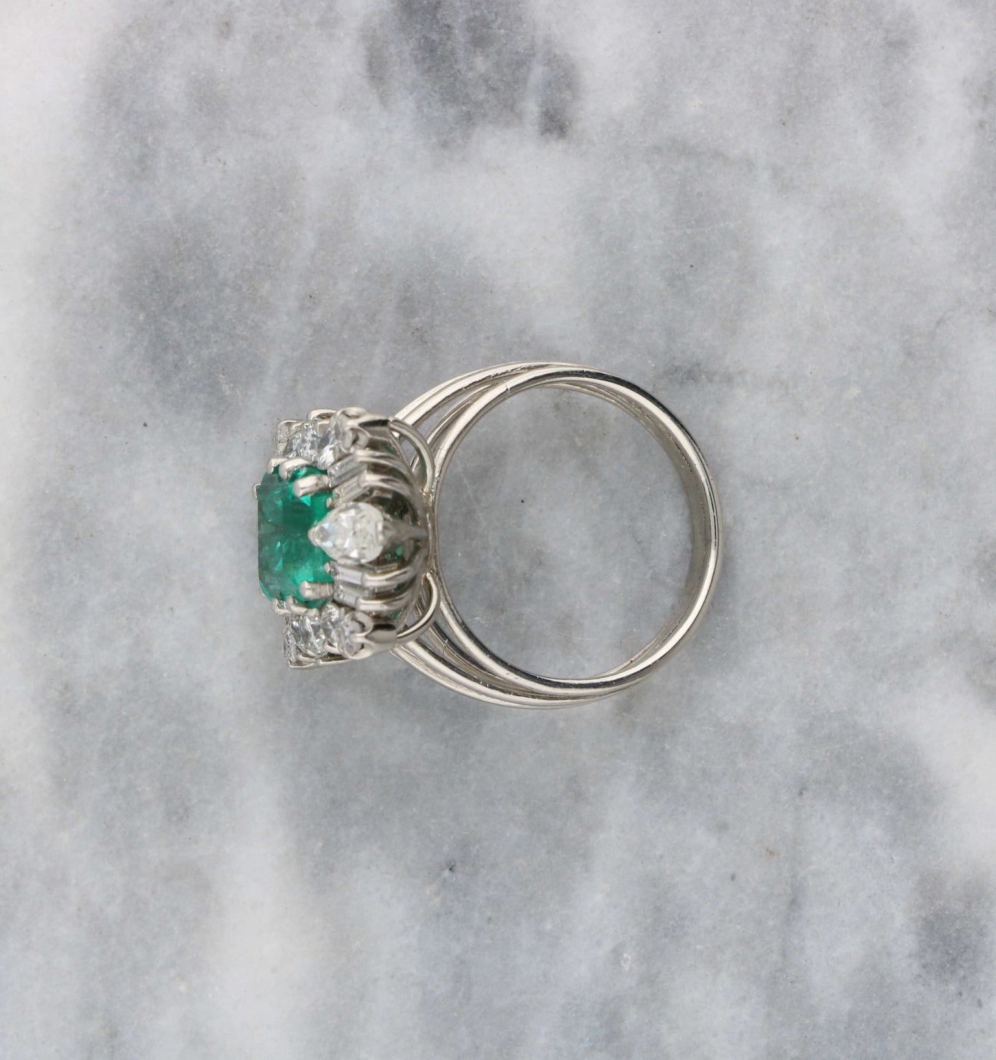 Emerald and diamond cluster ring