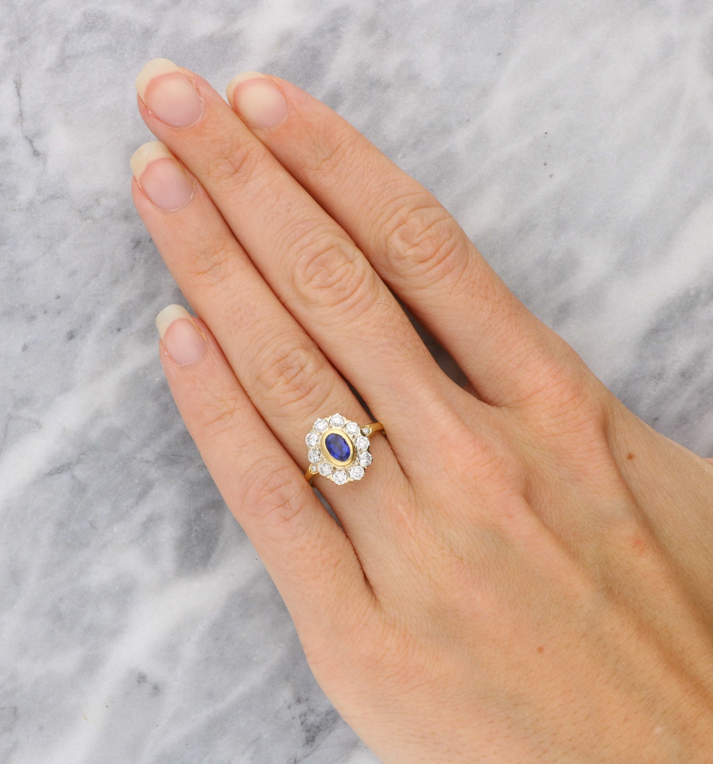 18ct sapphire and diamond cluster engagement ring
