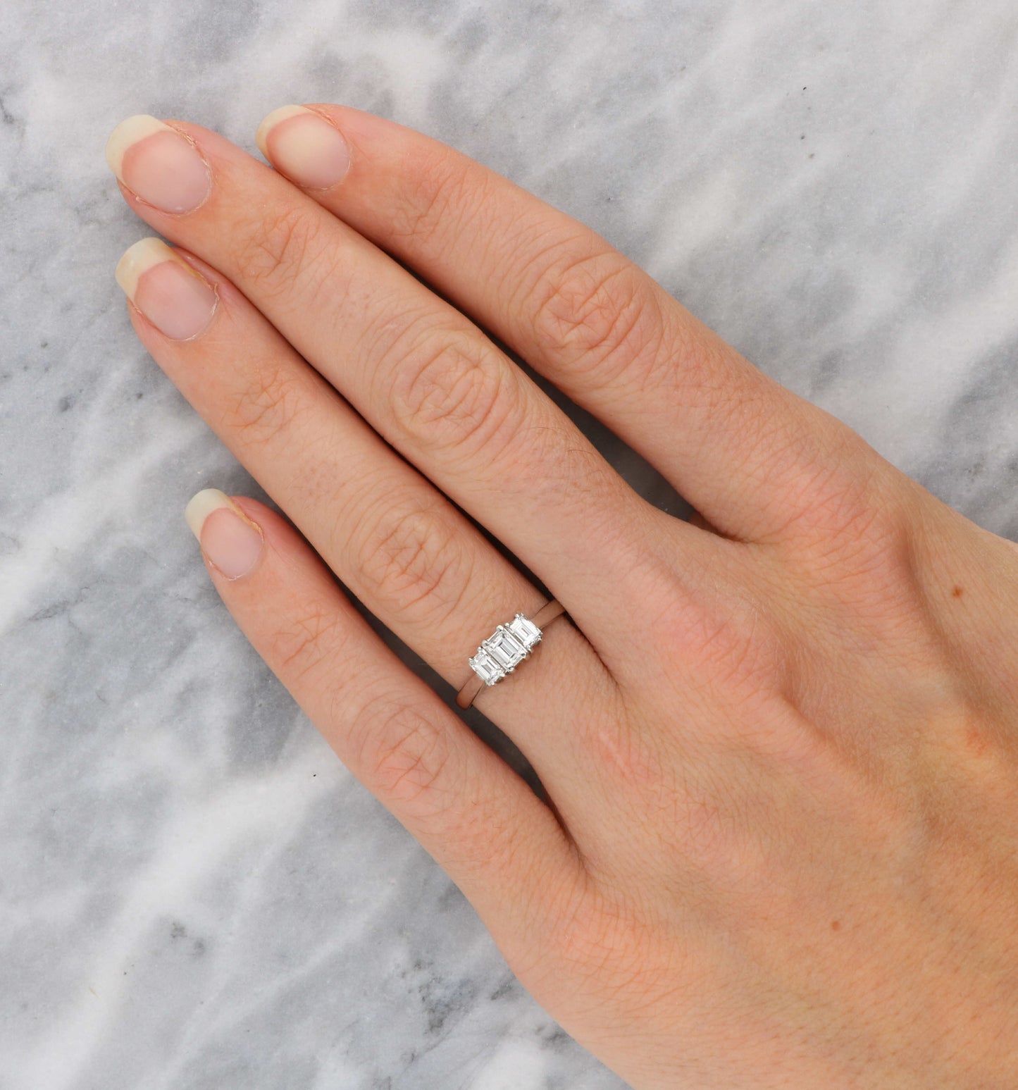 18ct and platinum emerald cut diamond 3 stone engagement ring
