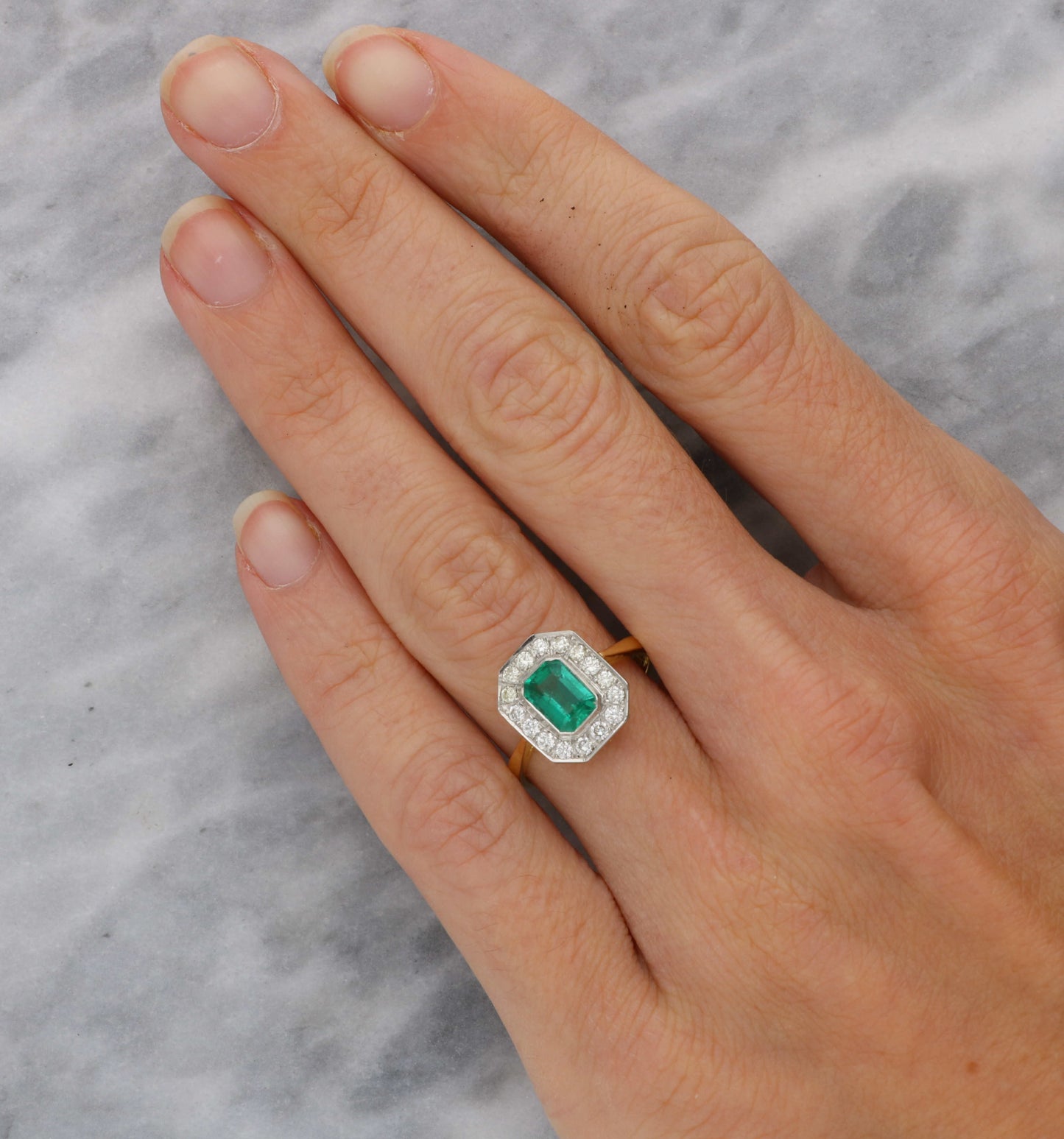 18ct and platinum emerald and diamond engagement ring