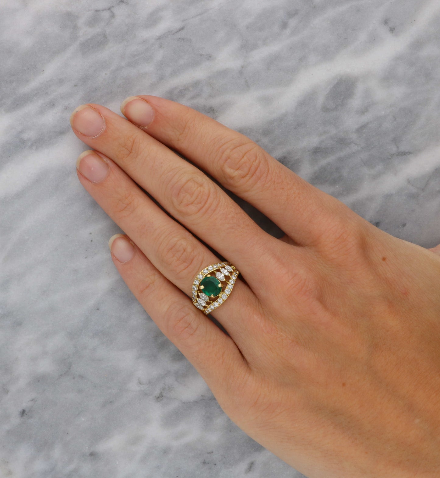 18ct emerald and diamond marquise cluster ring