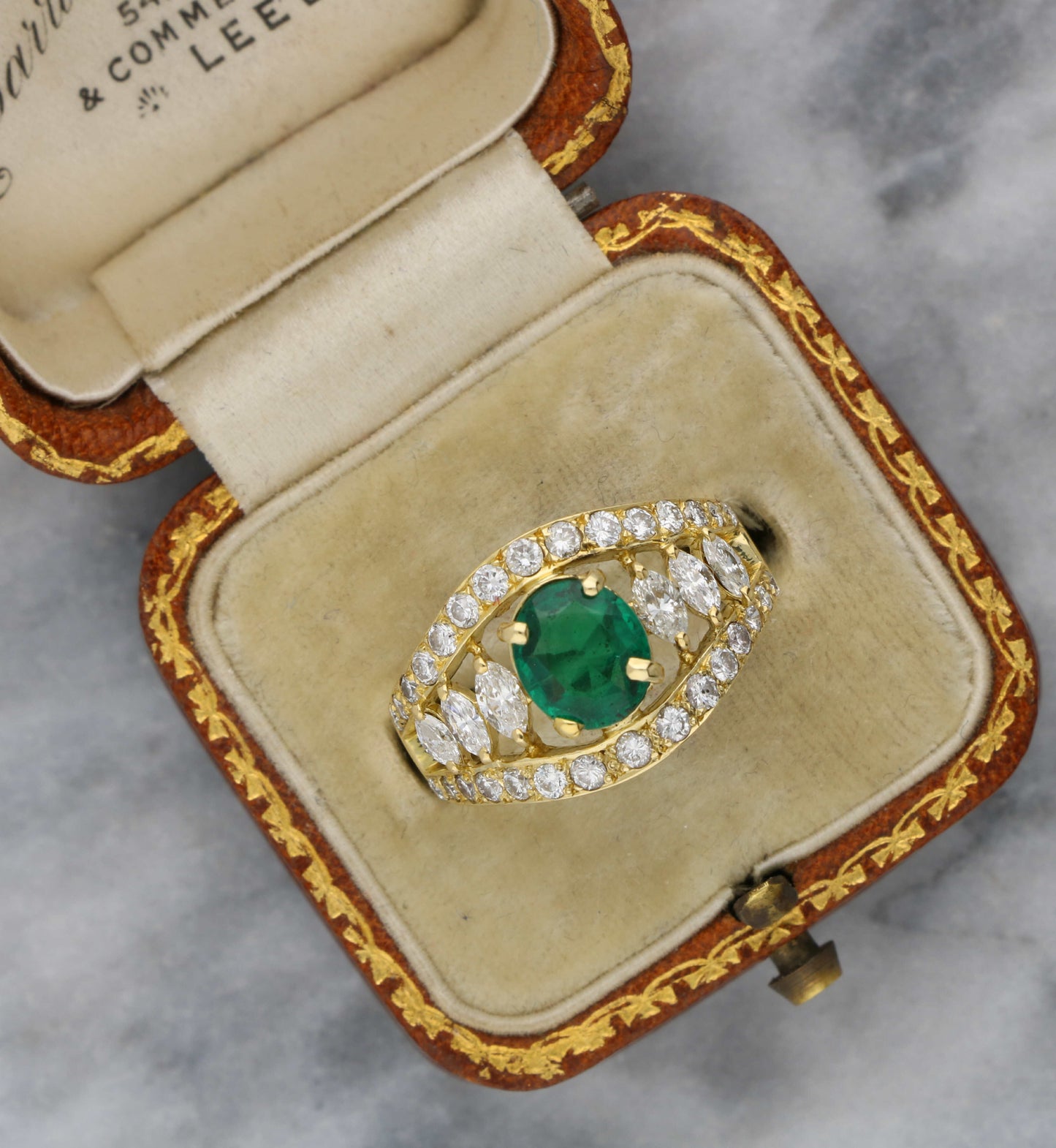 18ct emerald and diamond marquise cluster ring