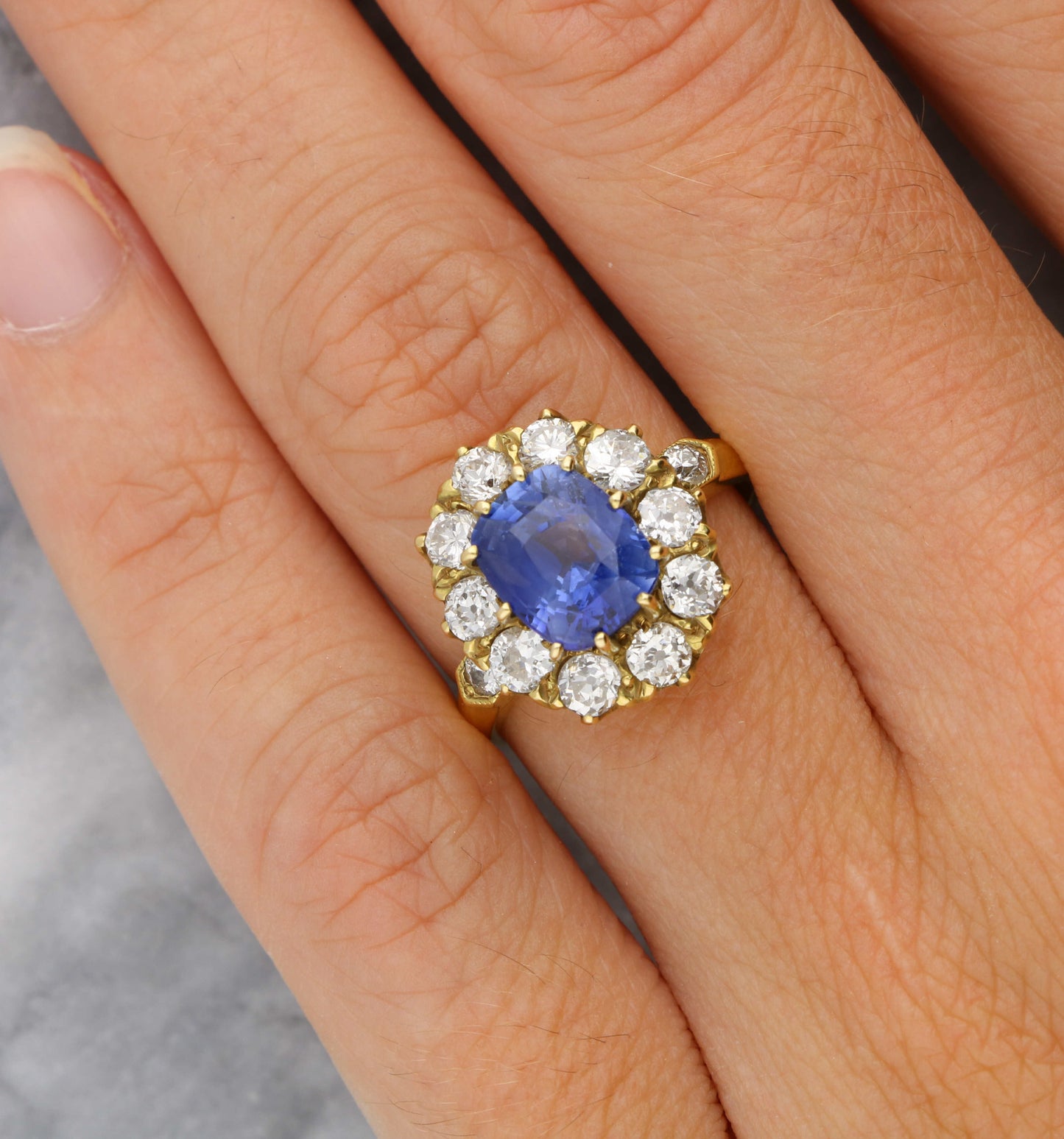 18ct sapphire and diamond cluster engagement ring