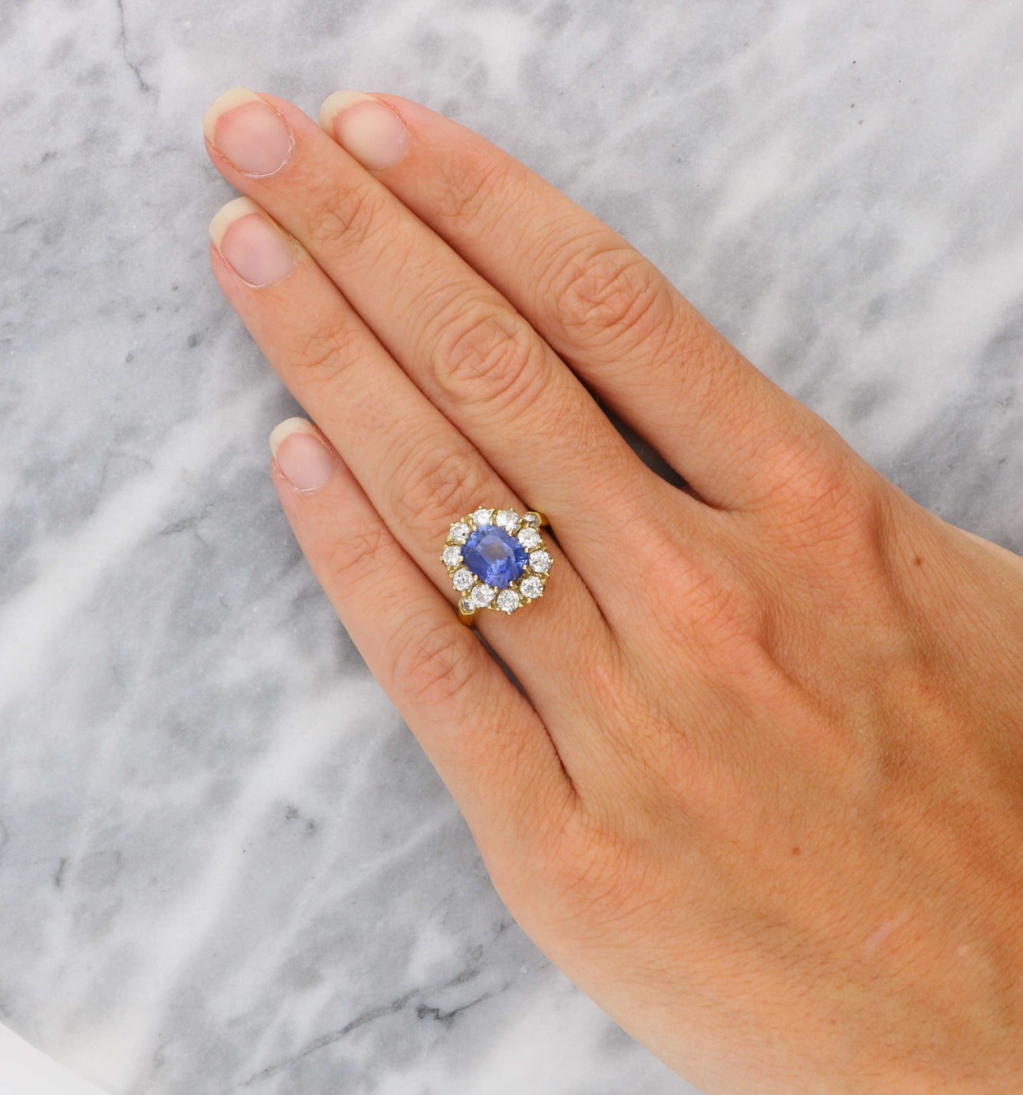 18ct sapphire and diamond cluster engagement ring