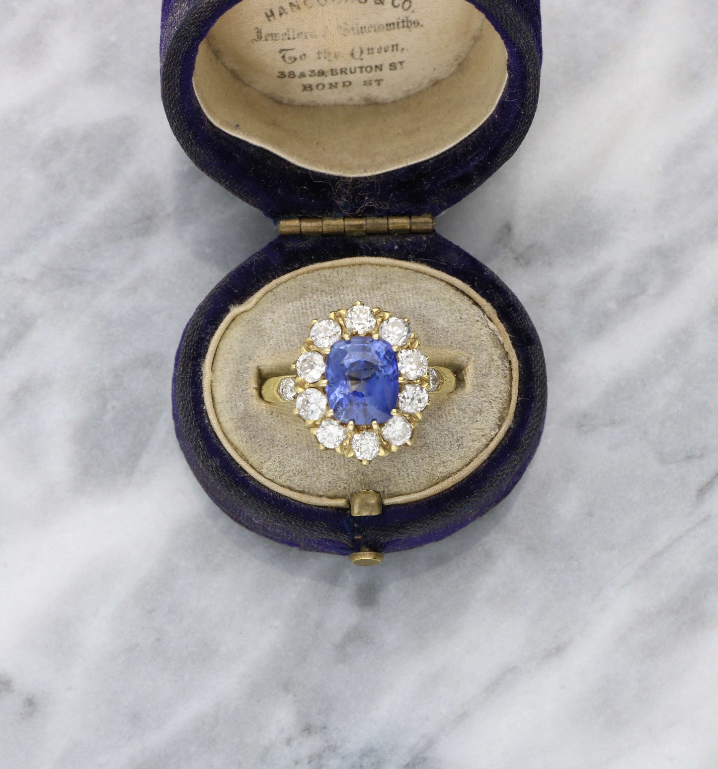 18ct sapphire and diamond cluster engagement ring