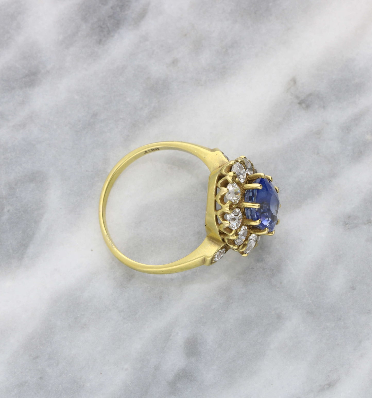 18ct sapphire and diamond cluster engagement ring