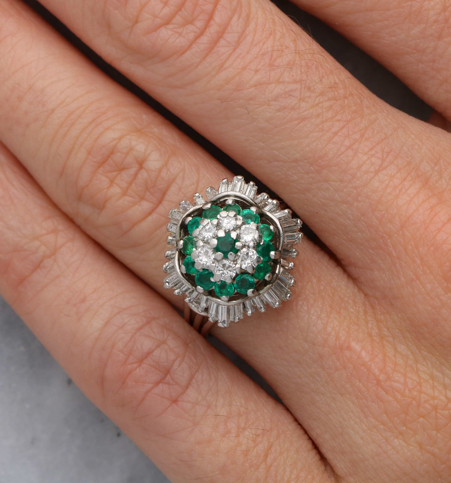 Emerald and diamond cluster ring