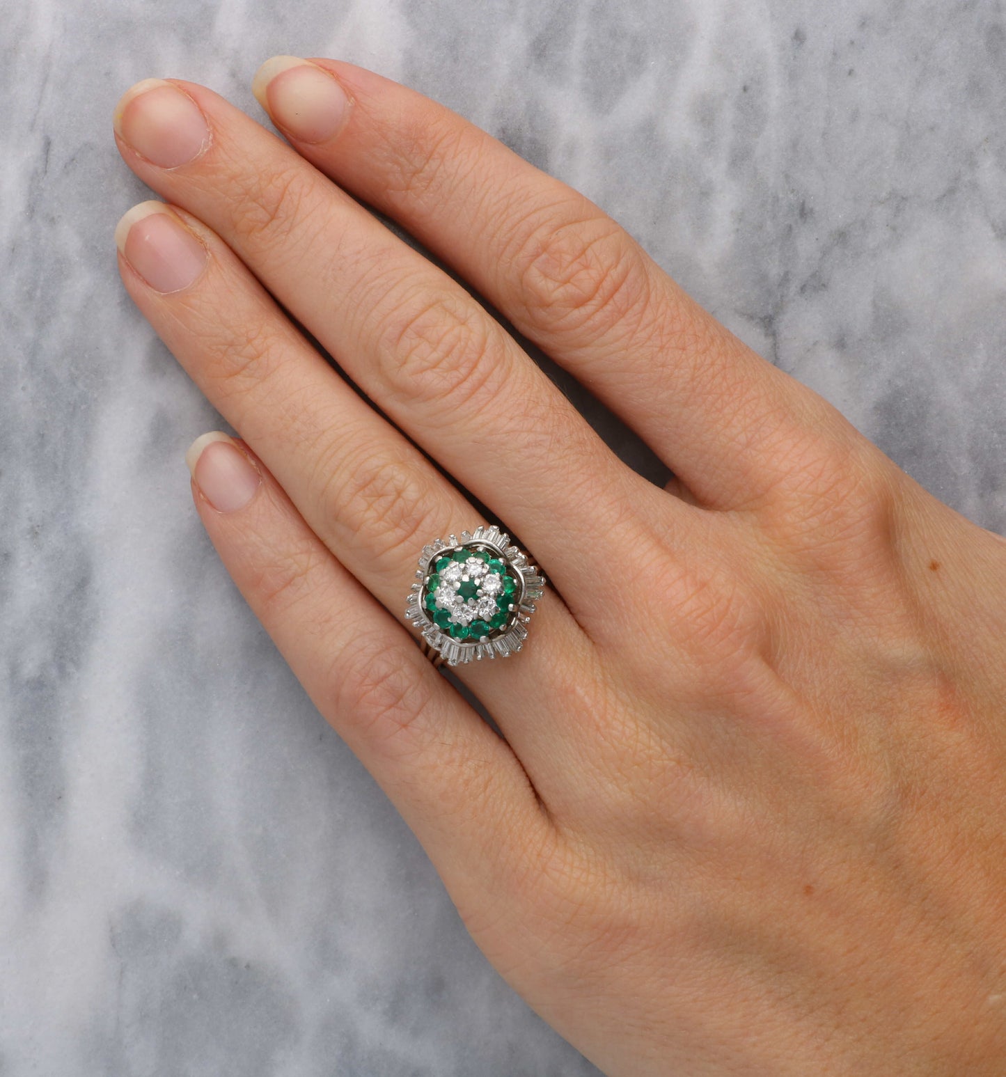 Emerald and diamond cluster ring