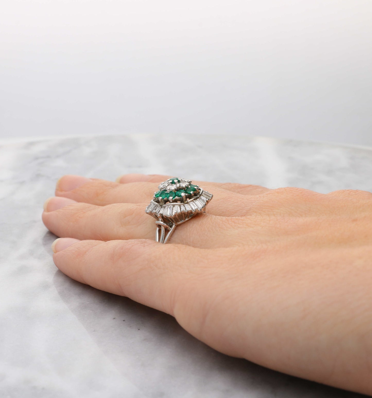 Emerald and diamond cluster ring