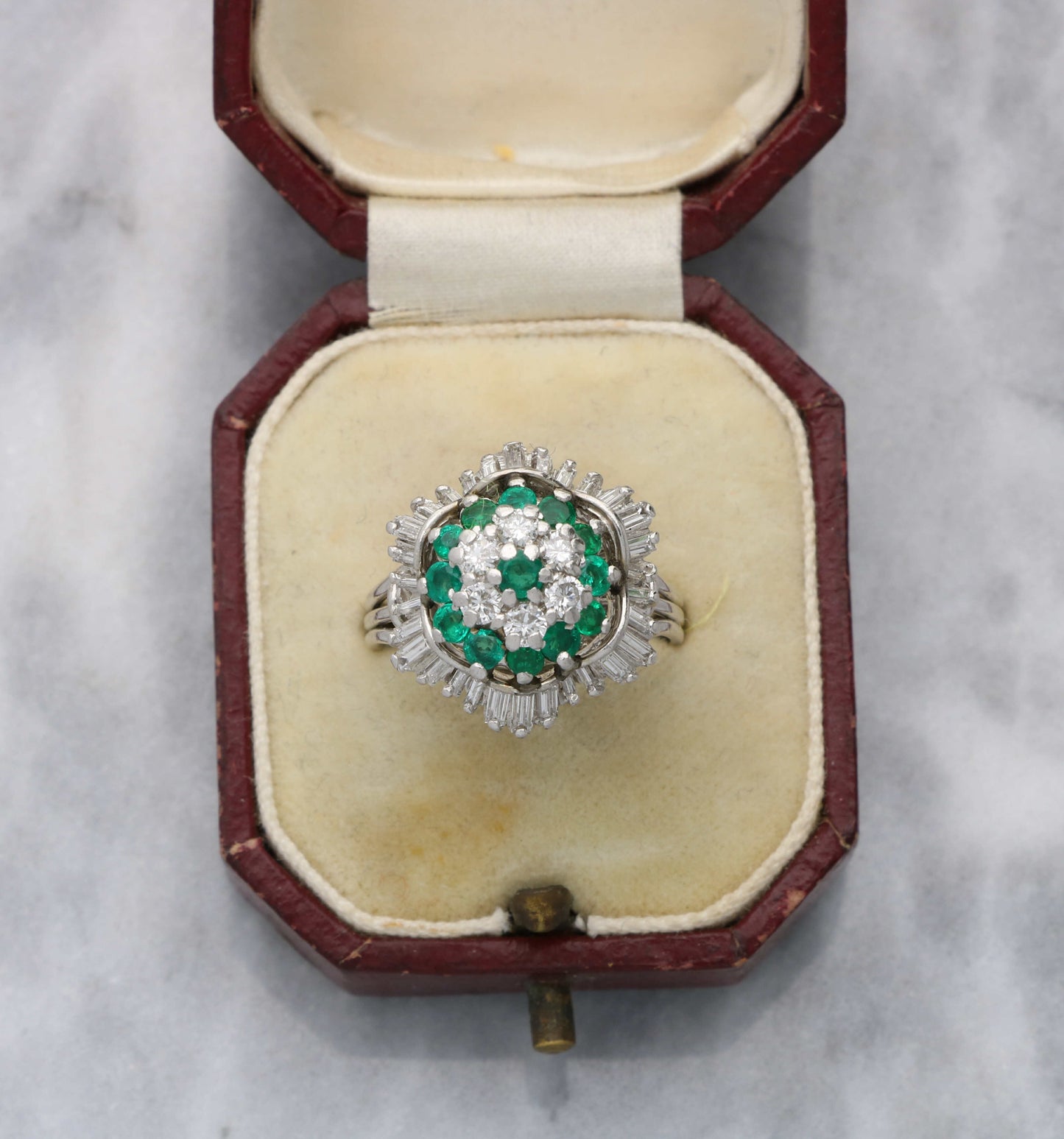 Emerald and diamond cluster ring