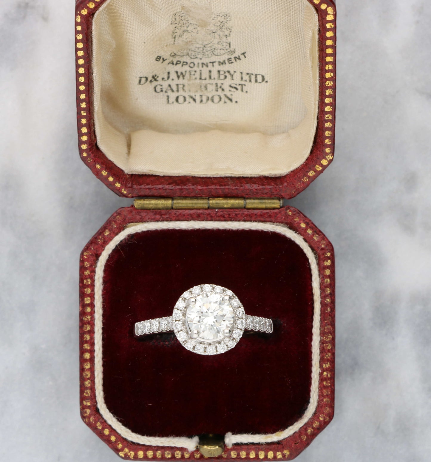 Platinum 1.10ct diamond halo engagement ring