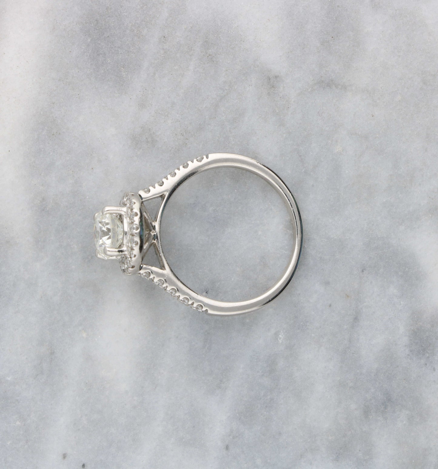 Platinum 1.10ct diamond halo engagement ring