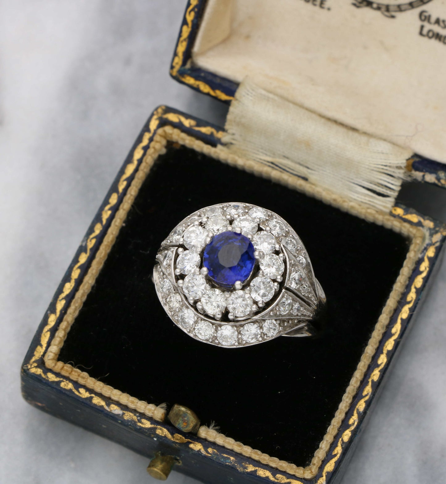 French platinum sapphire and diamond cluster ring