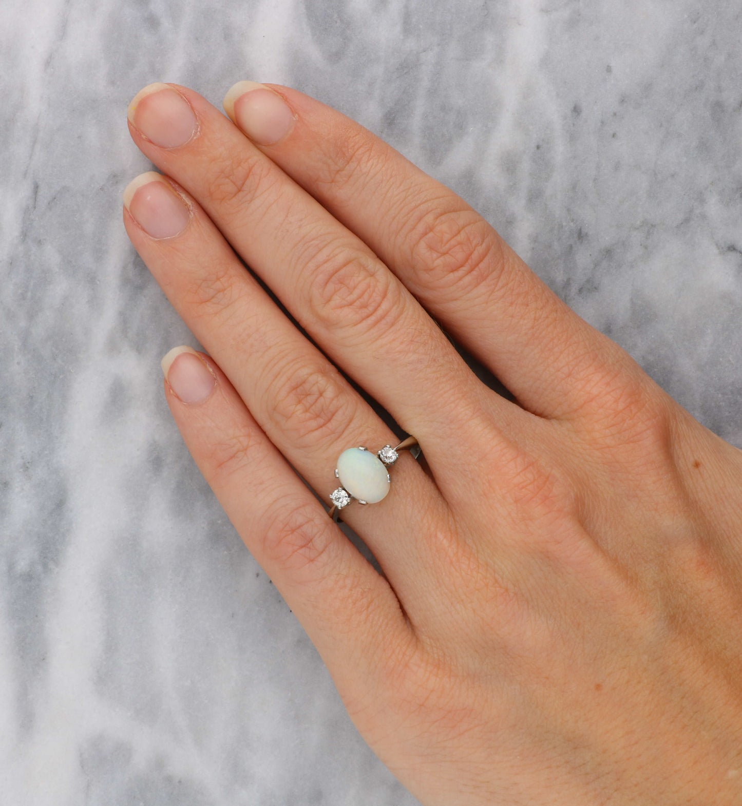 Platinum opal and old cut diamond 3 stone ring