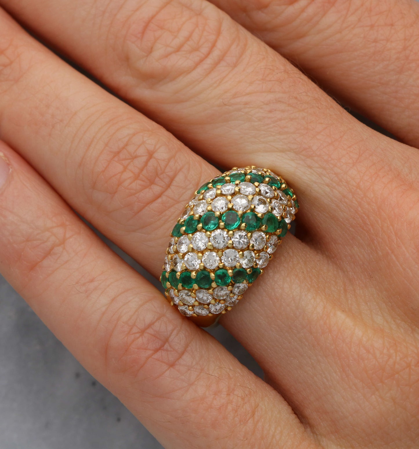 18ct emerald and diamond bombe ring