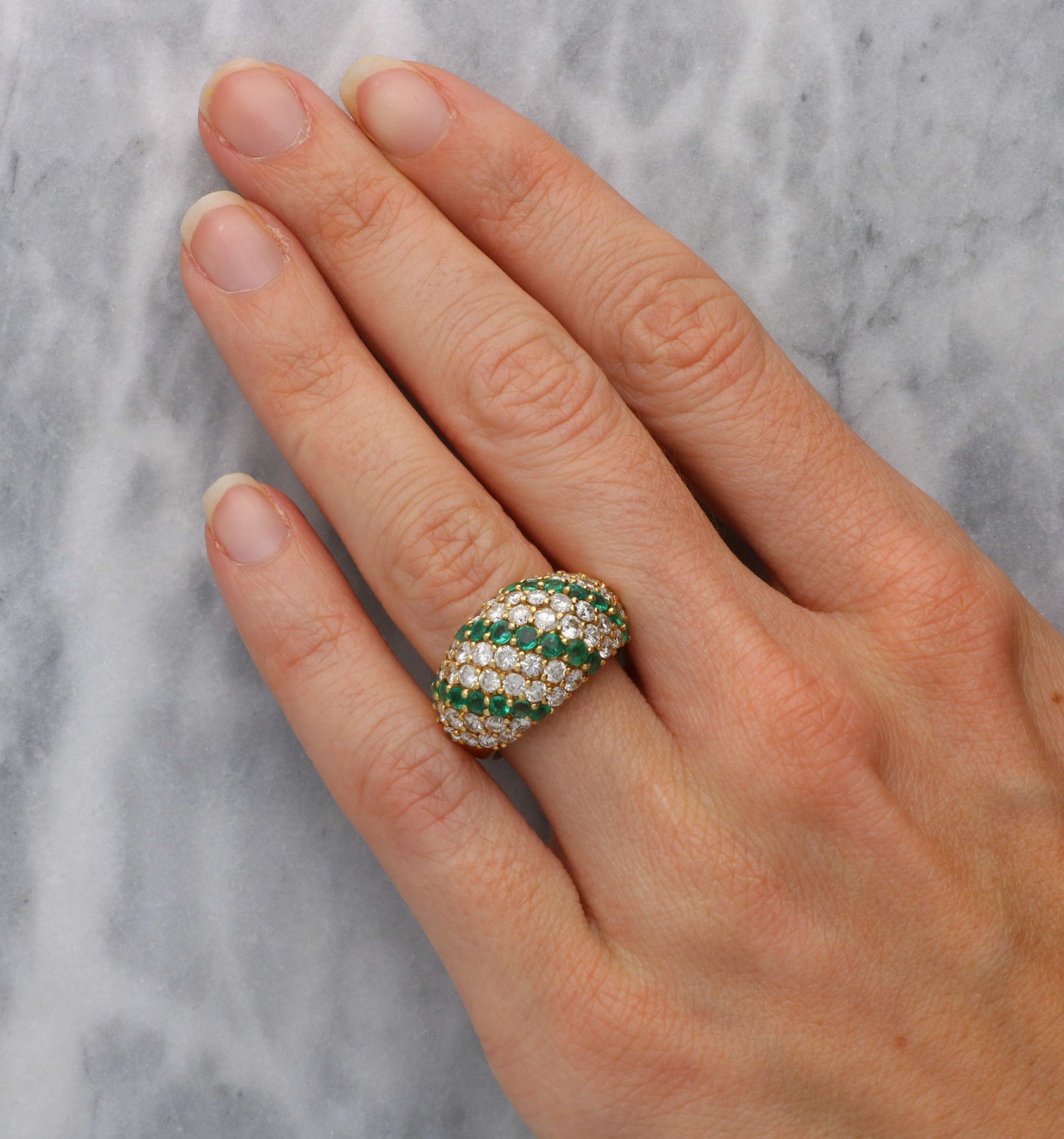 18ct emerald and diamond bombe ring